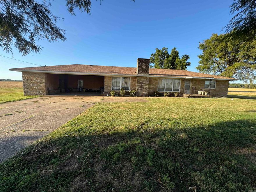 Opportunity knocks with this classic ranch style house with stone exterior in Jonesboro! This property if perfect for a fix and flip and is in need of repair. If sits on .86 acres +/= just across from Nestle on East Highland with 2 shop buildings Cash or bank financing only. R-1 zoning but has commercial potential if rezoned! This is a great old home place with lots of character and has some beautiful old hardwood floors. Property Sold AS IS with all faults.