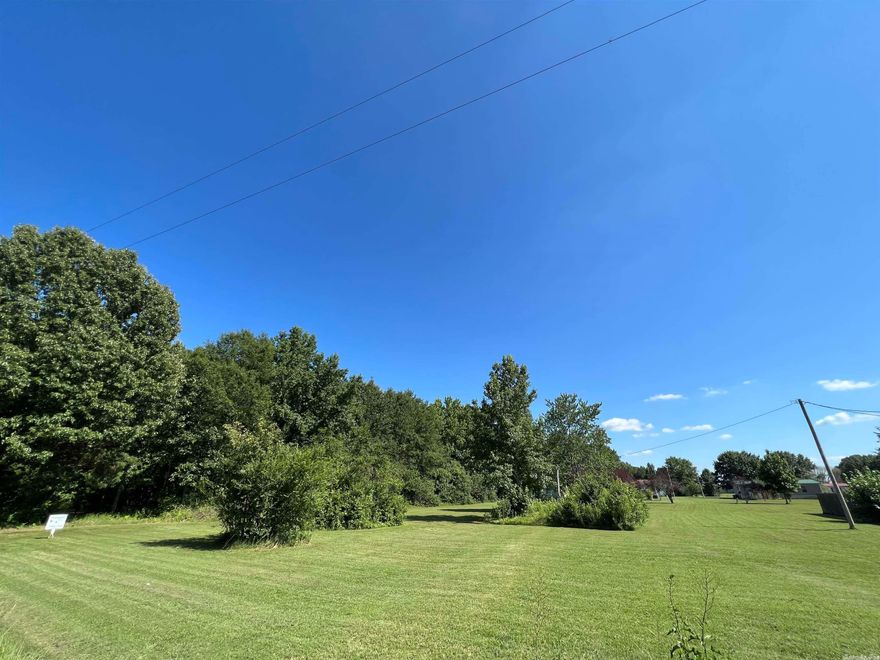 Come see this great spot to build or put your mobile home on. Utilities are at the road.