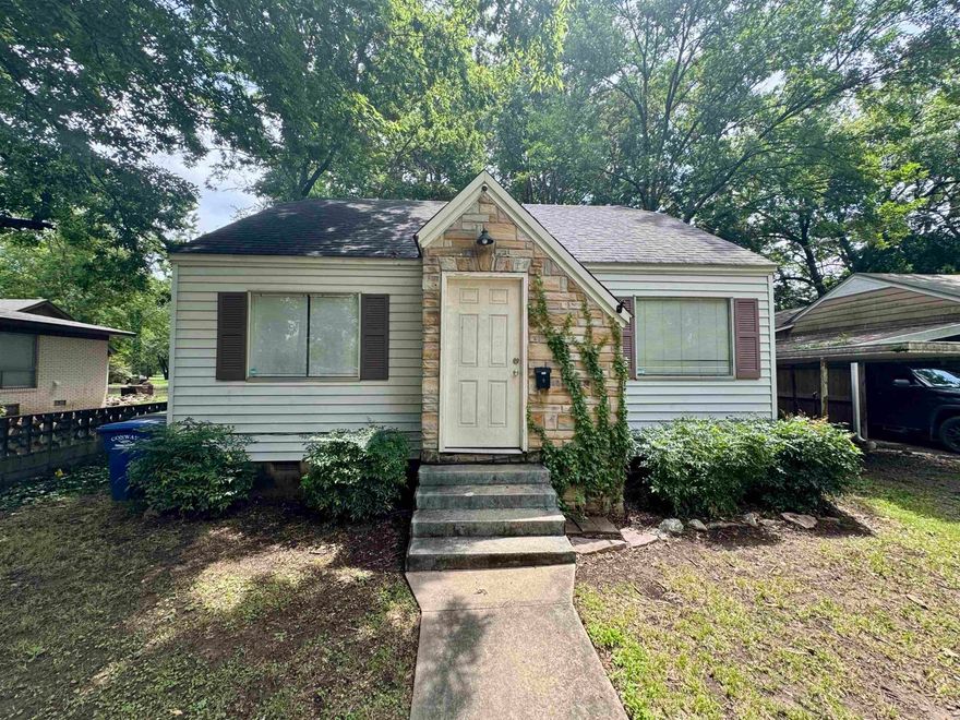 Charming and full of character, this 2-bedroom, 1-bath 1947 cottage in Downtown Conway offers original hardwood floors, a cozy living area, and a galley-style kitchen with included refrigerator and laundry hookups. Situated on a fenced lot with a covered carport and storm shelter, it’s just minutes from UCA, Hendrix College, parks, and local dining. Schedule your showing today!