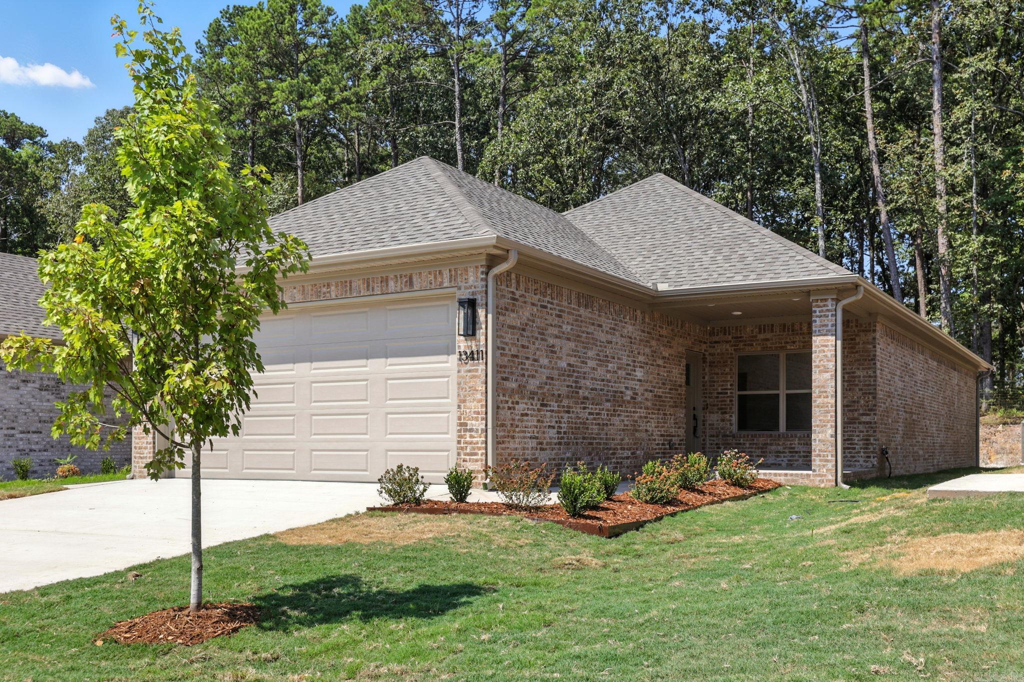Don't miss this rare chance to rent a high-quality new construction home in the heart of West Little Rock for just $2600/month + Utilities! This thoughtfully designed single-family home offers a welcoming front porch and a spacious, open floor plan perfect for both everyday living and entertaining. The highlight of the layout is the private owner's suite, quietly tucked at the rear of the home with peaceful views of mature trees. You'll love the spa-like ensuite bath featuring dual vanities and an oversized walk-in closet with ample storage. Designer-selected finishes throughout will elevate every space with modern style and comfort. Located in a prime area close to shopping, dining, and top-rated schools, this home blends convenience and charm. Act now to secure your place!