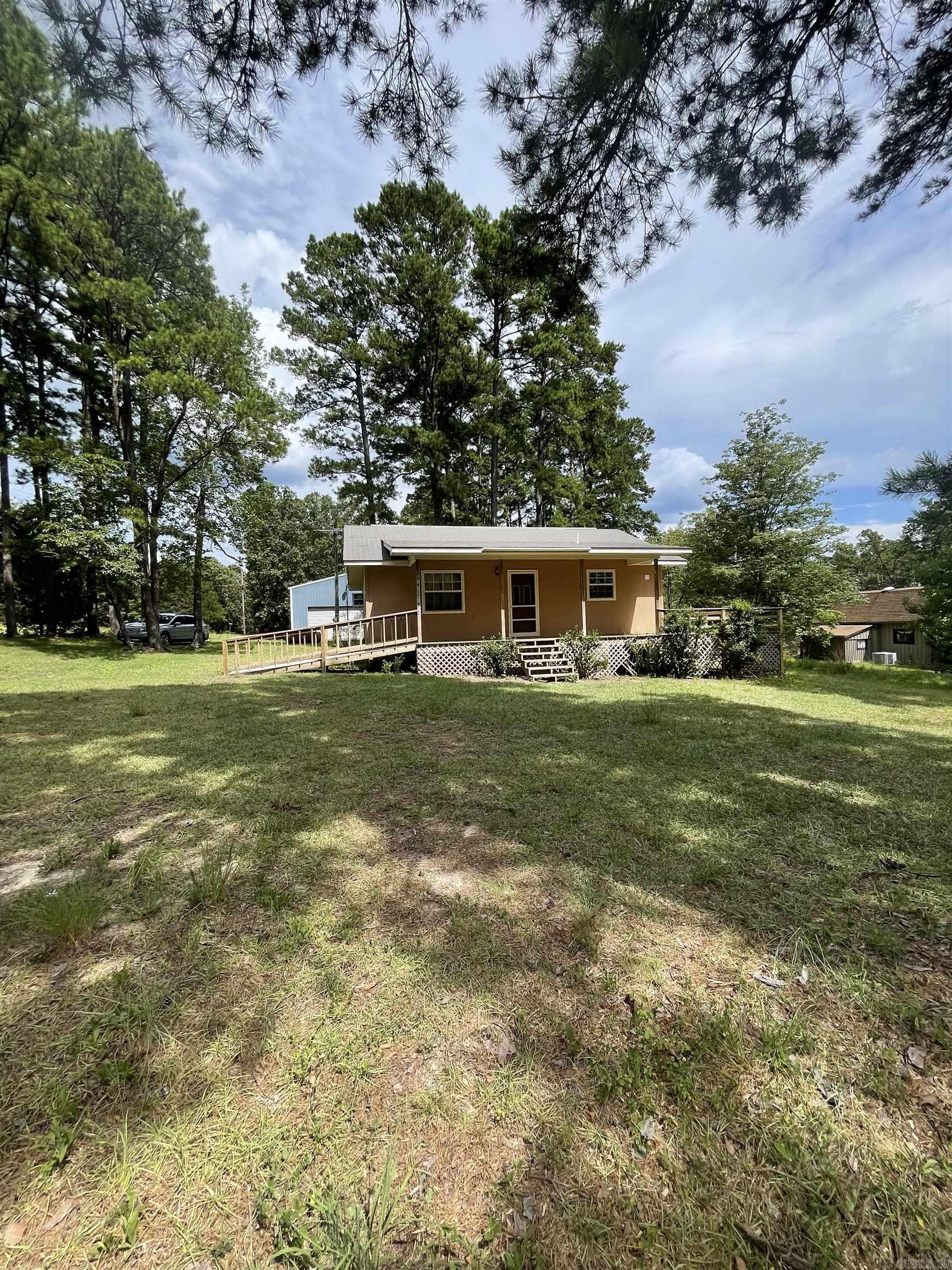 Welcome to 5 Iris Circle this is a 832 square-foot home on 4 lots located in a quiet, small community in Drasco, AR, with a short walk to a rock beach for swimming and short drive to launch a boat at community boat ramp. Also there is a Drive through 30 x 50 shop you could park your vehicle, boat, store all your lake toys. There is a wheelchair accessible ramp going to the front porch. Whether youāre looking for a home or a weekend getaway Come take a look at this property. This home has a new well pump and new lines that run from the pressure tank to the well, Roof in 2008 the window unit has heat and cool 5 to 7 years, Hot water tank and 2012. Seller will give credit $3500 back at closing for deck repair.