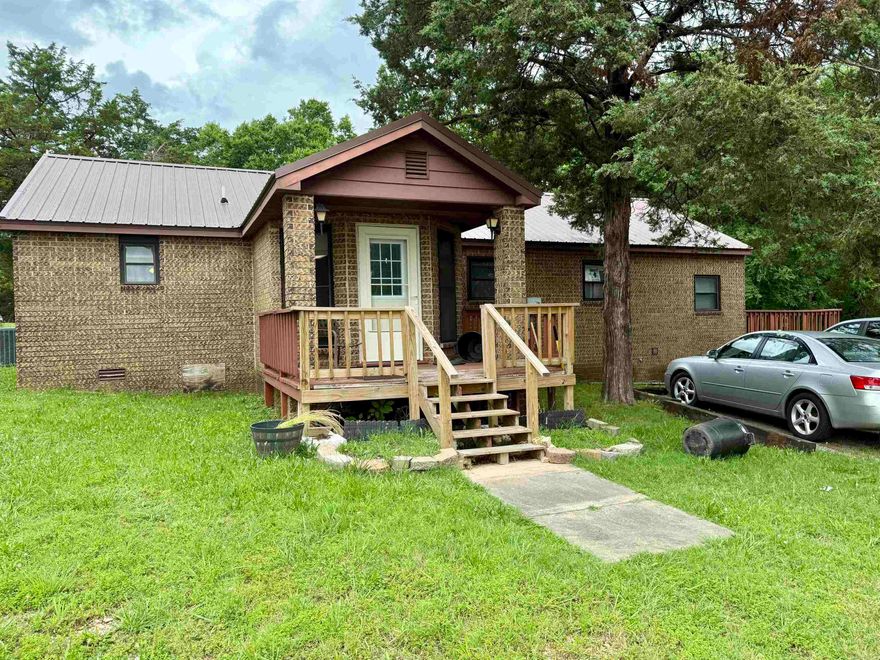 Endless Potential!  Charming 2-bedroom, 1-bath home featuring a cozy wood burning fireplace and a versatile detached shop.  The shop is approximately 630 sq feet that is heated and cooled and includes a half bath-ideal for hobbies, a home office, or extra storage.  With a little TLC, this could be the perfect starter home you've been looking for.$179,999