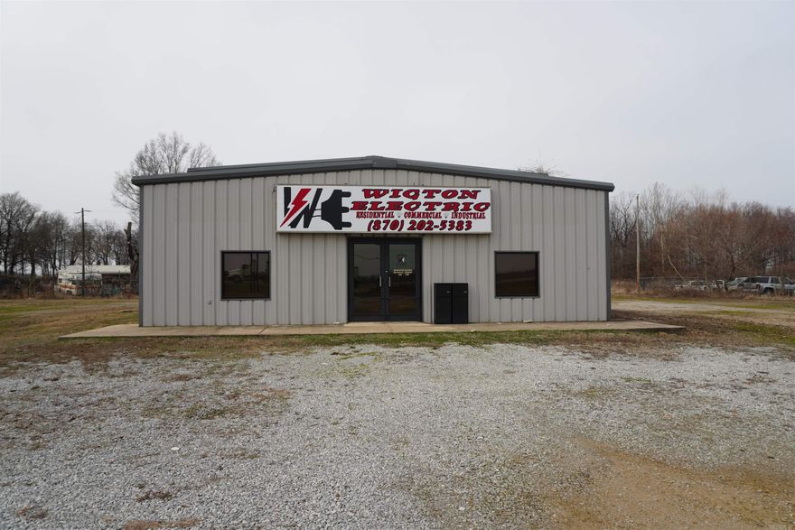Take a look at this commercial building with acreage for sale! Located in a high traffic area on the 4 lane between Pocahontas and Walnut Ridge, with approx. 207 feet of Highway frontage & an average daily traffic count of 14,000 vehicles! Roughly a half mile south of Peco, the largest employer in the county(think customers).  This would make a great mechanic shop for any type of automotive repair, including tractor trailer, with 2 bays having a 14' roll up doors & the opposing side could be converted to matching roll up doors to create 2 drive thru bays for taller vehicles.  Then there are an additional six, 12' bay doors, and a large gas furnace in work shop area. At the front of the building is office space with a restroom, with heat & ac. The main building has 5,680 sq ft m/l, all being insulated & on a concrete pad. The auxiliary building has an additional 1,200 sq ft with walk in door and 2 standard 10' bay doors, no heat or ac in second building. All of this on 2.19 acres m/l that is level and cleared with a few perimeter trees. The last business occupying this property was Wigton Electric & the 20' sign is still at front of property. Prior to that it was Superior Poultry.