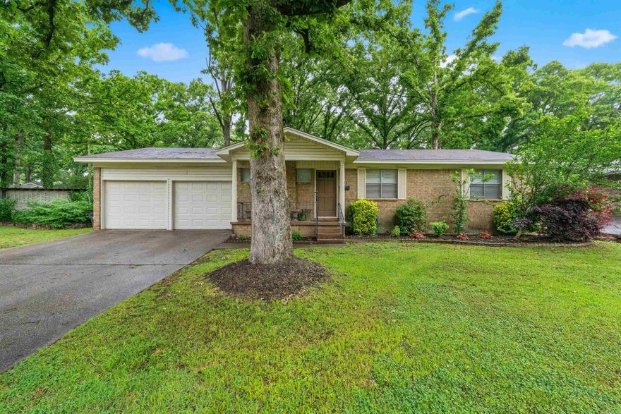Step into comfort & style w/this thoughtfully updated 3 bedroom, 2 bath home featuring a spacious 2 car garage w/high end finishes. Beautiful LVP flooring flows seamelssly through the home, while a warm gas fireplase creates an inviting focal point in the living. The kitchen is designed to impress, showcasing granite counters, abundant cabinetry, & a layout perfect for both everyday living & entertaining. Retreat to the oversized primary, offering the space and comfort you've been looking for. Enjoy peaceful mornings & relaxing evenings on the screened in porch. The outbuilding has electricity-ideal for a workshop or studio. With major system updates including HVAC and Water Heater (2020), this home offers both beauty and peace of mind. YOU DON'T WANT TO MISS THIS ONE!