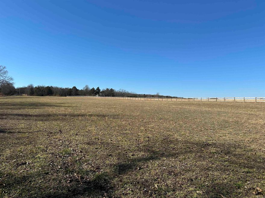 Discover the perfect blend of convenience and country charm with this beautiful 4-acre m/l tract just outside of town. This very level property offers an exceptional building site, already perked for a three-bedroom home, making it truly build-ready. Utilities are in place with power, electric, and high-speed fiber available—ideal for modern living while enjoying a peaceful setting. The land is fenced on two sides and features a lush covering of red clover, adding both beauty and natural appeal. Whether you’re planning a forever home, a hobby farm, or a quiet retreat close to town amenities, this property checks all the boxes. Rare opportunity for a clean, usable parcel with minimal prep needed—bring your plans and start building your dream. Maybe put CALLING ALL BUILDERS or BUILD YOUR NEW HOME