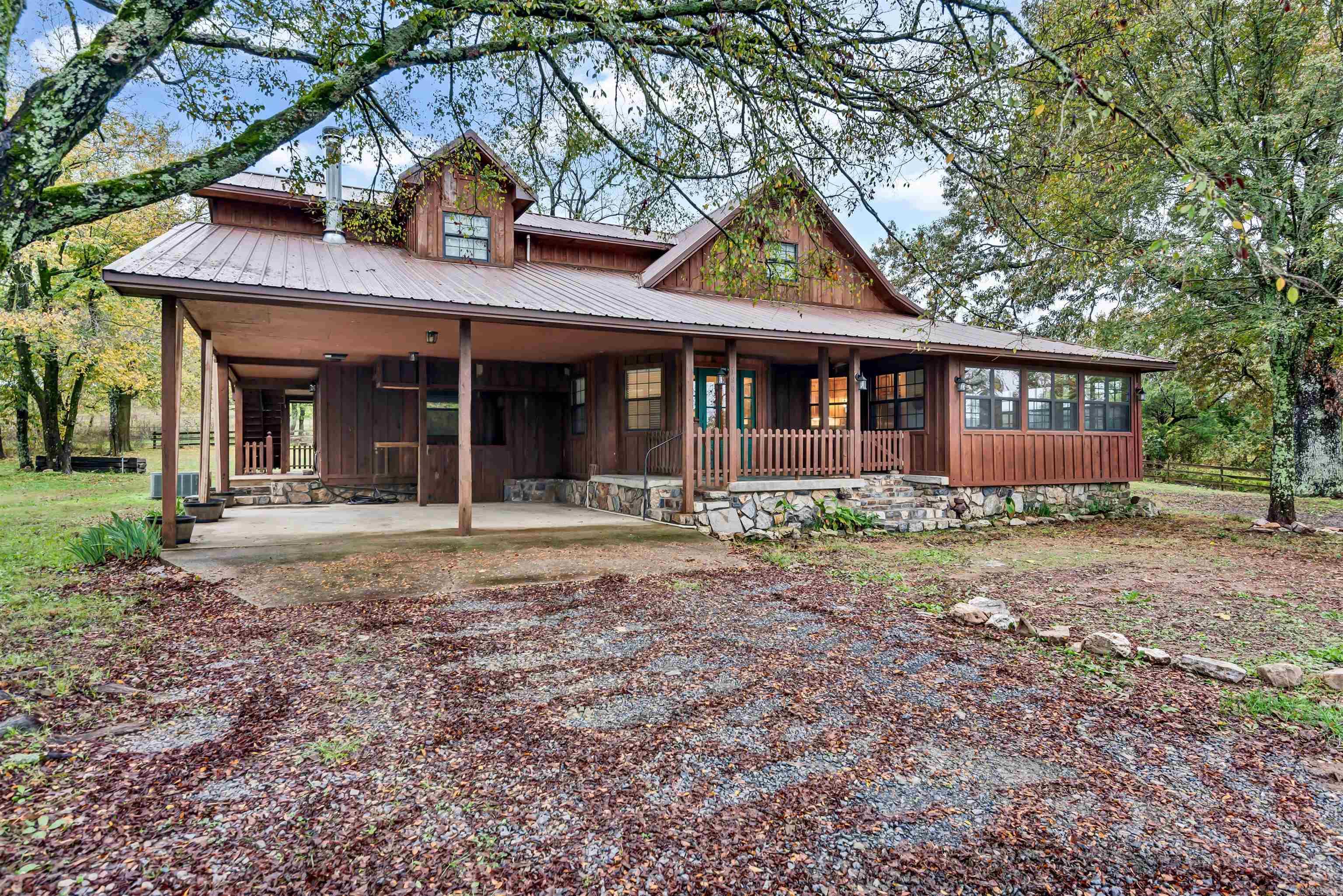Expansive, beautifully redone historic farmhouse nestled amongst the Ouachita Mountains in the highly sought after Board Camp area. This unique property sits on 49 acres, has Board Camp Creek frontage, and has 3 ponds including one fully stocked with Cat Fish and Crappie. Currently operating as a successful Airbnb, this property is perfect for large groups visiting the Wolf Pen Gap ATV Trail System. The home has 4 large bedrooms, and sleeps 24 thanks to beautifully crafted bunk beds! The home also has multiple common areas, a beautiful open concept kitchen, large his and hers bathrooms, a formal dining room, and a spacious outdoor deck. Built in 1910, but recently remodeled, the property still boasts some interesting original features such as unique built in storage throughout and a gorgeous hardwood staircase and banister. This property comes fully furnished. If youāre in the market for a large, legacy property for your family or as an investment short term rental property, this one is not to be missed!