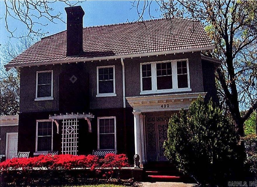 Set on a rare double lot in the Midland Hills Subdivision, this timeless 1930 built residence offers over 3400SF of refined living space. The thoughtfully designed layout includes 4 spacious bedrooms 3.5 bathrooms, formal living and dining rooms, a breakfast room, two versatile flex spaces and a private office. Original tongue and groove wood floors run throughout the 2nd and 3rd floors, adding warmth and character to every step. An elevator provides convenient access to three levels of this 4 level home. The attic is finished and provides easy access to storage and utility equipment. The property also features a detached garage, a separate storage building, and a large parking area, which is a rare find in a historic setting. Rich in charm and full of potential, this one-of-a-kind home offers exceptional space, elegance, and flexibility. Don't miss viewing this beautiful home. Schedule your showing today!