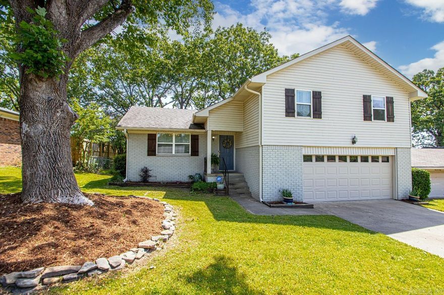 Welcome to this cutie located in the heart of Sherwood. You will love the tall vaulted ceilings in the living room and the cozy fireplace. Enjoy morning coffee on the screened in porch right off of the kitchen. Great back yard for kids to play. 2 full baths and 3 bedrooms upstairs and a half bath downstairs. The home features an updated kitchen and a storage room off the garage.