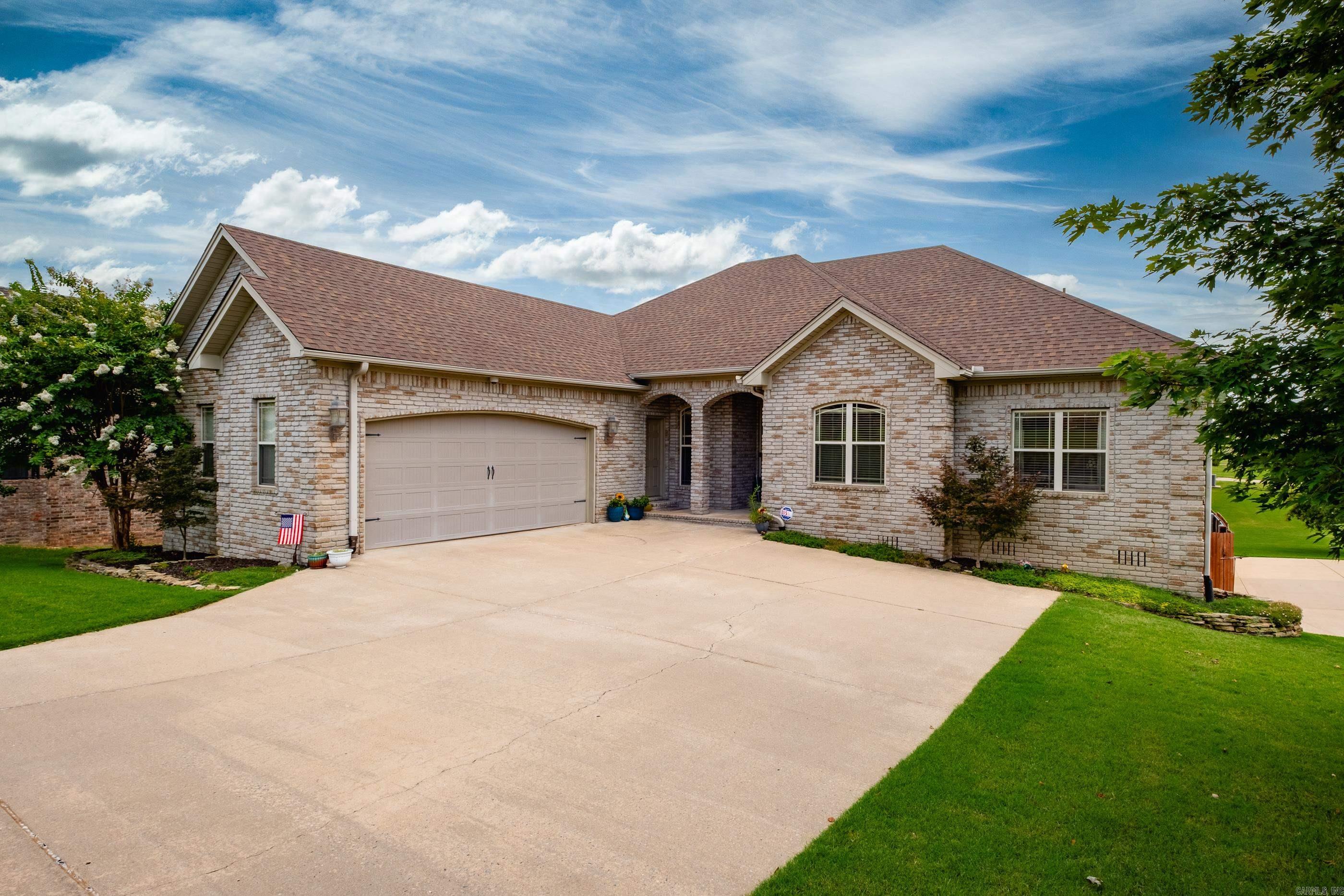 Outstanding property w/ a wonderful flexible floor plan! Tons of storage space! Located on a big corner lot - there is a front two car side loading garage on upper level and lower level has a oversized one car garage w/ extra wide driveway leading to parking pads behind the fence for boat/trailer/RV storage! The lower garage accesses the crawl space w/ an area for storage and also enters the home's downstairs area making it perfect for private guest quarters that include a living area, bedroom/bath & walk-in closet. The main level of the home has a nice open floor plan - formal dining room, living area, spacious kitchen w/ granite and stainless steel appliances and hardwoods are throughout home (except 2 BRs). Guest BR & BA is apart from the primary suite and 2 other guest bedrooms that are on the other side. Both levels have covered outdoor areas and the home is located in a great neighborhood of beautiful homes! See Agent Remarks.