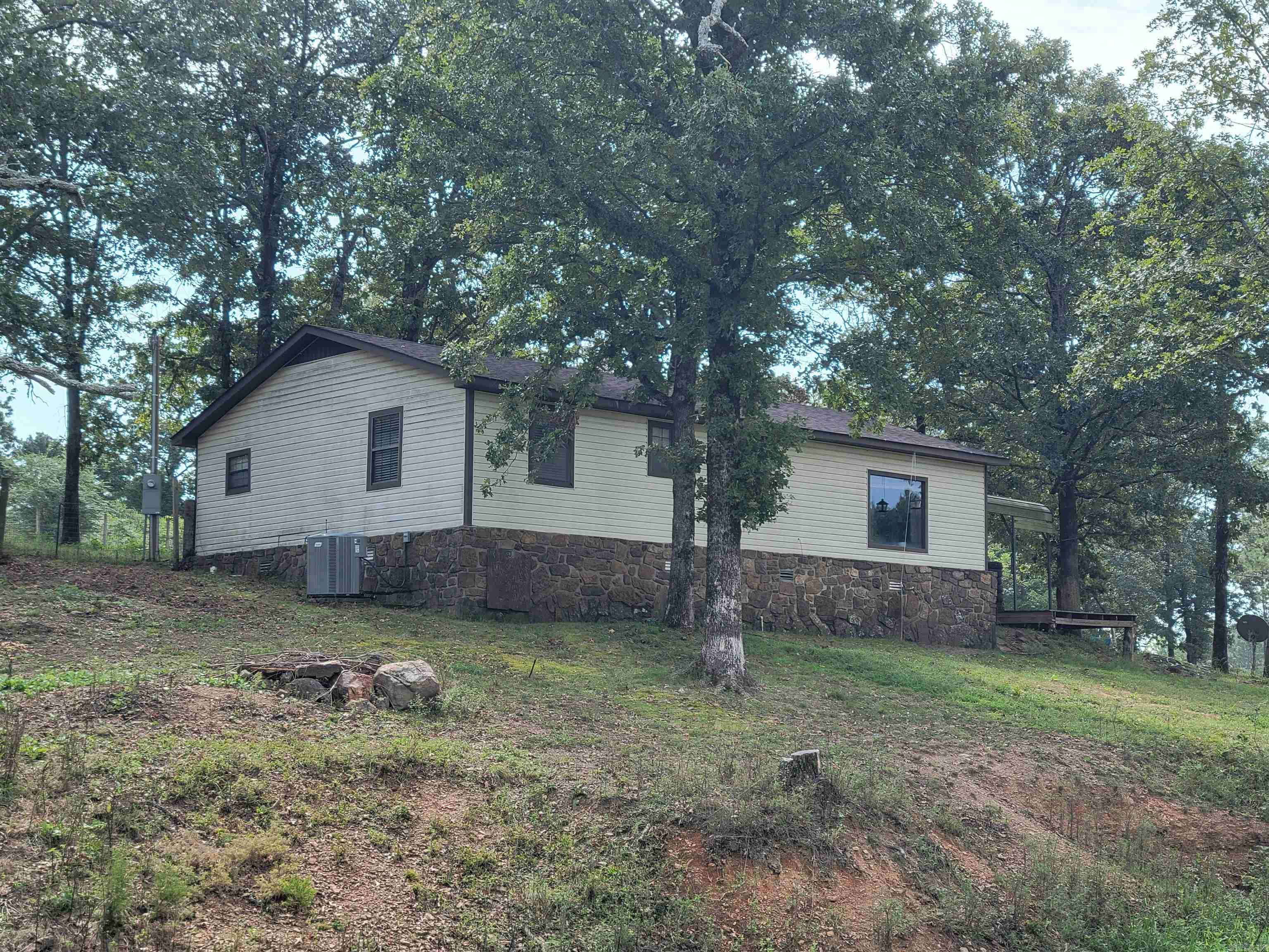 This property sits on the edge of the national forest in the small town of Appleton. It would make a great weekend escape for those who enjoy spending time riding the trails and hunting in the fall. While some improvements are needed the roof was replaced in 2022 and a 10 x 16 shop with electricity conveys. Covered parking and plenty of room to bring your toys make this a great opportunity for those who love the outdoors.