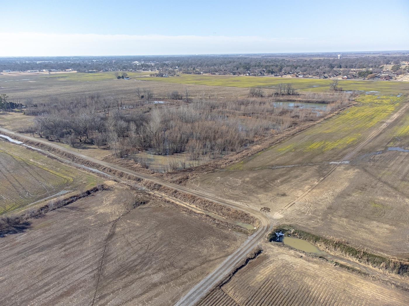 Welcome to Market 5437 N County Road 725 of Blytheville, Arkansas. 40.66 +/- acres nestled in the heart of the Arkansas Delta. Opportunity knocks with this rare offering. This parcel is prime with possibility featuring both timberland and cropland. Several structures on the property convey, but the value of the property is in the land. Conveniently located near Interstate 555 and approximately 60 miles to Jonesboro, AR and 70 miles to Memphis, TN. Call today to schedule your tour and make an investment in tomorrow.