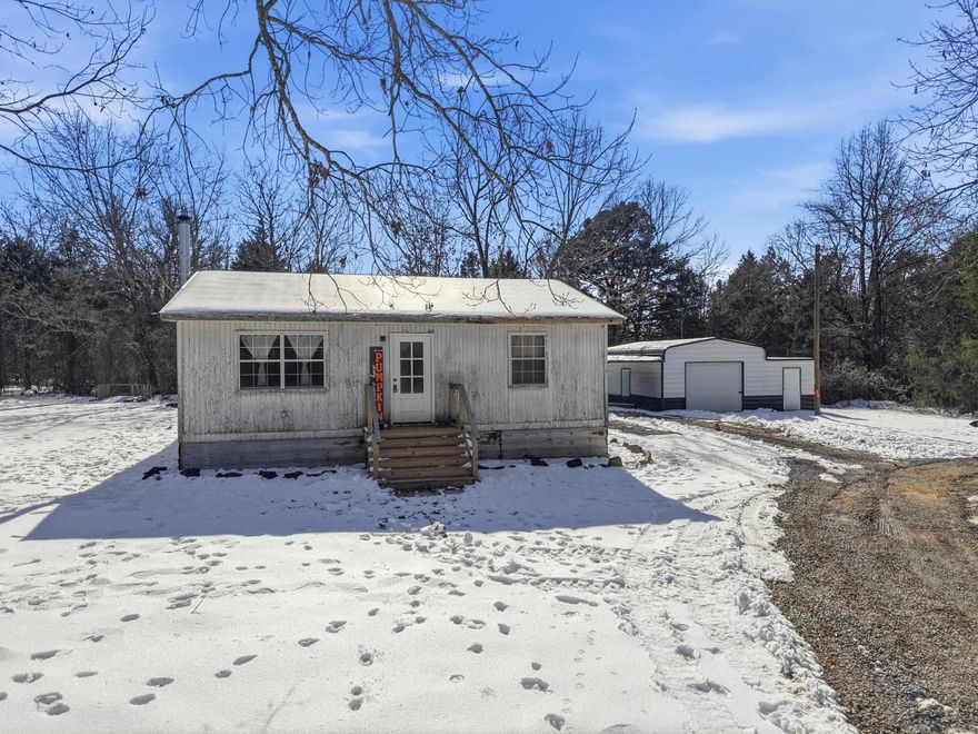 Unique Homestead Opportunity on 7+ Acres with Barn! This peaceful property offers homestead living with privacy & versatility and is a hunters dream with a wet weather creek and wildlife. Enjoy country living while just 7 miles to the beautiful Woolly Hollow State Park, 10 miles to restaurants and shopping in Greenbrier and 20 miles to Greers Ferry Lake. The cozy 2 bedroom home has so much to offer including and open floorplan and tons of updates including NEW HVAC (11/2022), tankless water heater (12/2022), plumbing & electrical (12/2022), ceilings & drywall throughout (2025), wood stove/chimney (2/2023), flooring (3/2023), kitchen cabinets &  butcher block counter tops (1/2023), stainless steel appliances (1/2023), bathroom vanity/mirror/toilet (1/2023), covered back porch (2024), front deck (2023), 3 windows (11/2022), front/back fiberglass doors (11/2022), barn (6/2024), RV electrical & water hookups (6/2023), chicken coop (2023), two raised garden beds (2025) and more! This property has endless possibilities, so come experience what your future home in a peaceful setting has to offer. Schedule a tour today. Won’t last long! Agents see remarks and list of updates