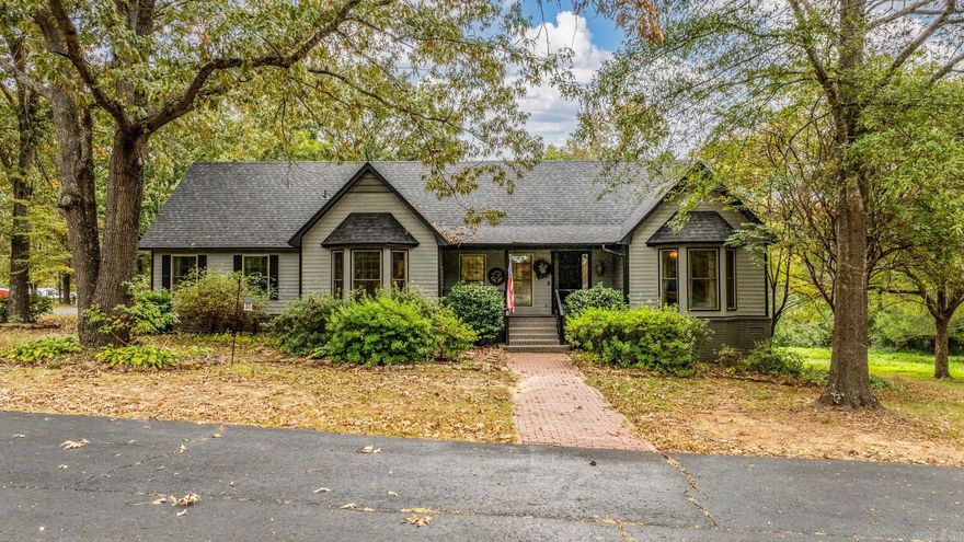 Nestled among the trees on 4.33 acres, this Greenbrier property offers privacy and character in a non-cookie-cutter setting. With nearly 2,800 SF of living space, updates include fresh interior paint in common areas, new carpet, a new HVAC combo unit, new water heaters, and a roof that’s about a year old. The spacious living room features vaulted ceilings and a stunning floor-to-ceiling brick wood-burning fireplace. A large kitchen with bay window, dining room with pocket doors, and centrally located laundry room make the layout both functional and inviting. This home offers 3 bedrooms, 3 full bathrooms, a bonus room, a large office with built-ins, a game room, and a garage with built-in shelving and a workbench. Outside, enjoy an in-ground pool with newer liner and pump, a pool house for storage, and a 30x40 shop with additional storage and a basketball goal. Give me a shout to set up your showing!