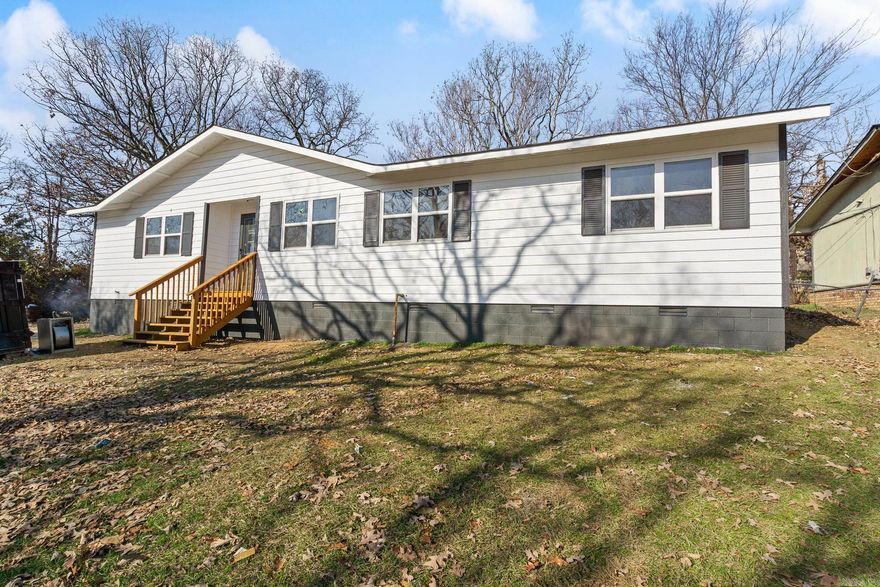 Newly renovated home in Hackett, close to Sebastian Lake! This 3 bed 2 bath home is complete with a new HVAC, roof, interior and exterior paint, LVP flooring, back splash, granite counter tops, tiled shower/tub, plumbing fixtures, light fixtures and new front and back decks. Waiting for its new owner! Agent owned.