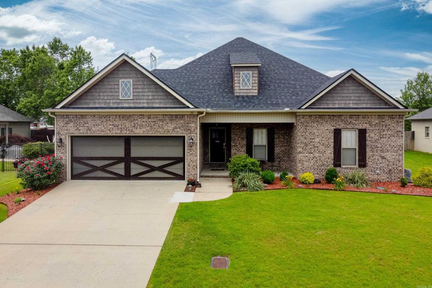 Introducing an impeccably maintained & exquisitely landscaped home. Just in time for the summer season! Upon stepping inside this charming residence, you will be greeted by an inviting warm & neutral color palette & a generously proportioned layout. Recently installed wood floors seamlessly combine comfort, practicality, and style thru the entire house. Treasured by a single family since built, this residence boasts a master suite that is separated from the guest bedrooms, providing a tranquil sanctuary for both homeowners and guests. A sliding barn door ensures privacy for the guest area, along with other noteworthy updates. However, this property that must be seen in person. With ample space, you will easily envision this as your new home. Situated in a community close to shopping, dining, and schools, this home also features recent floor coatings in the garage & pool, enhancing its aesthetic appeal & ease of maintenance. The backyard is where the magic truly unfolds, showcasing an in-ground heated saltwater pool & meticulously landscaped surroundings that offer a secluded retreat to relax after a busy day. Seize the chance to make this exceptional home yours. SEE AGENT REMARKS.