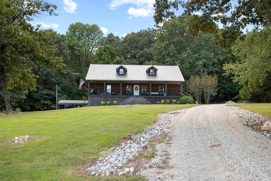 Take a look at this beauty!!! Escape to your own peaceful retreat in this charming wooden, cabin-style home nestled in the hills of Ravenden, Arkansas. Situated on just under 13 acres of beautiful, wooded land, this 3-bedroom, 2-bathroom home offers both privacy and convenience. With a newer metal roof, brand new flooring, all brand new appliances, new HVAC installed in 2023, and other recent updates throughout, this cabin is move-in ready and perfect for those seeking a serene lifestyle. The home features a 400 square-foot, mostly finished partial basement with ample storage space that walks out to a 2-car carport. Inside, you’ll love the large pantry, spacious laundry/utility room, and the thoughtful layout that maximizes comfort and functionality. Located on a paved road just 1.5 miles from Highway 63 and only 0.5 mile from the beautiful Spring River, this property offers the perfect balance of seclusion and accessibility. Although just outside the city limits, the home benefits from all city utilities, offering the best of both worlds. Don’t miss out on this rare opportunity to own a slice of paradise in the hills of Ravenden! Schedule a showing today!