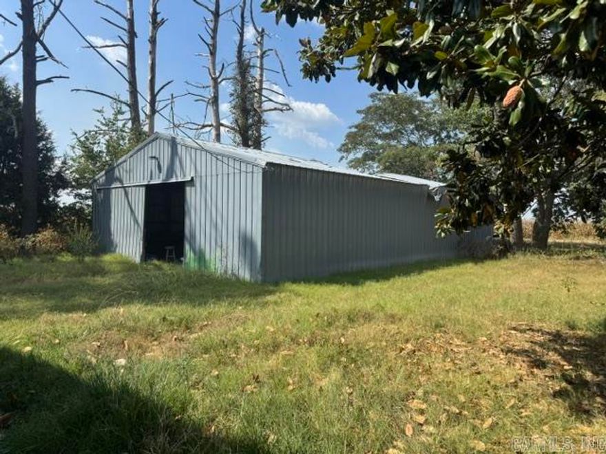 Discover the potential with this unique property featuring 7.7 acres of beautiful land filled with mature trees and wide-open spaces. The large yard offers endless possibilities for recreation, gardening, or future improvements. A spacious outbuilding/shop provides room for storage, hobbies, or projects, while the long chat driveway adds convenience and plenty of parking. The existing red home is ready for a creative touch whether you're looking to renovate, rebuild, or start fresh, this property offers the perfect canvas. Enjoy the peace of country living with plenty of space to make it your own!