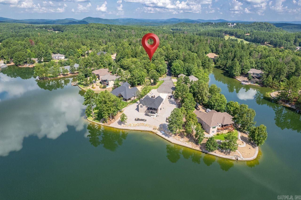 Build your dream home on these beautiful lots with a view of Lake Granada! Located on a quiet cul-de-sac just minutes from Granada Golf Course, this property offers privacy, natural beauty, and easy access to Hot Springs Village’s world-class amenities. Gentle slope may accommodate various home designs. Enjoy the peace and serenity of lake living with nearby walking trails, a boat ramp, and picnic areas. One of the few lake view lots still available—don’t miss it!