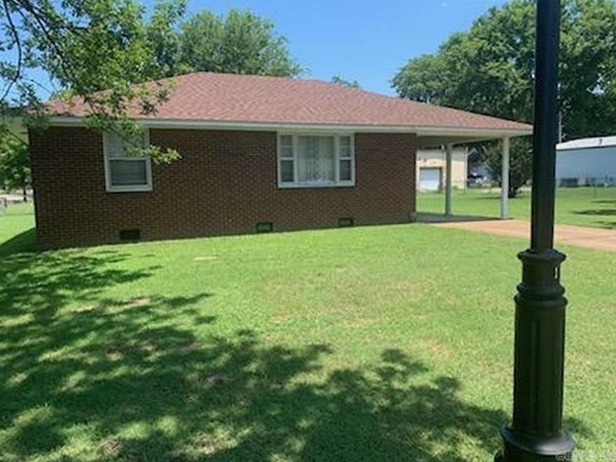 Very neat, clean and well maintained 2 bedroom 1 bath home located on a large corner lot approximately .50 acres in Walnut Ridge. Big laundry room and spacious living room. New roof installed this year. This property could be zoned Commercial call agent for details.