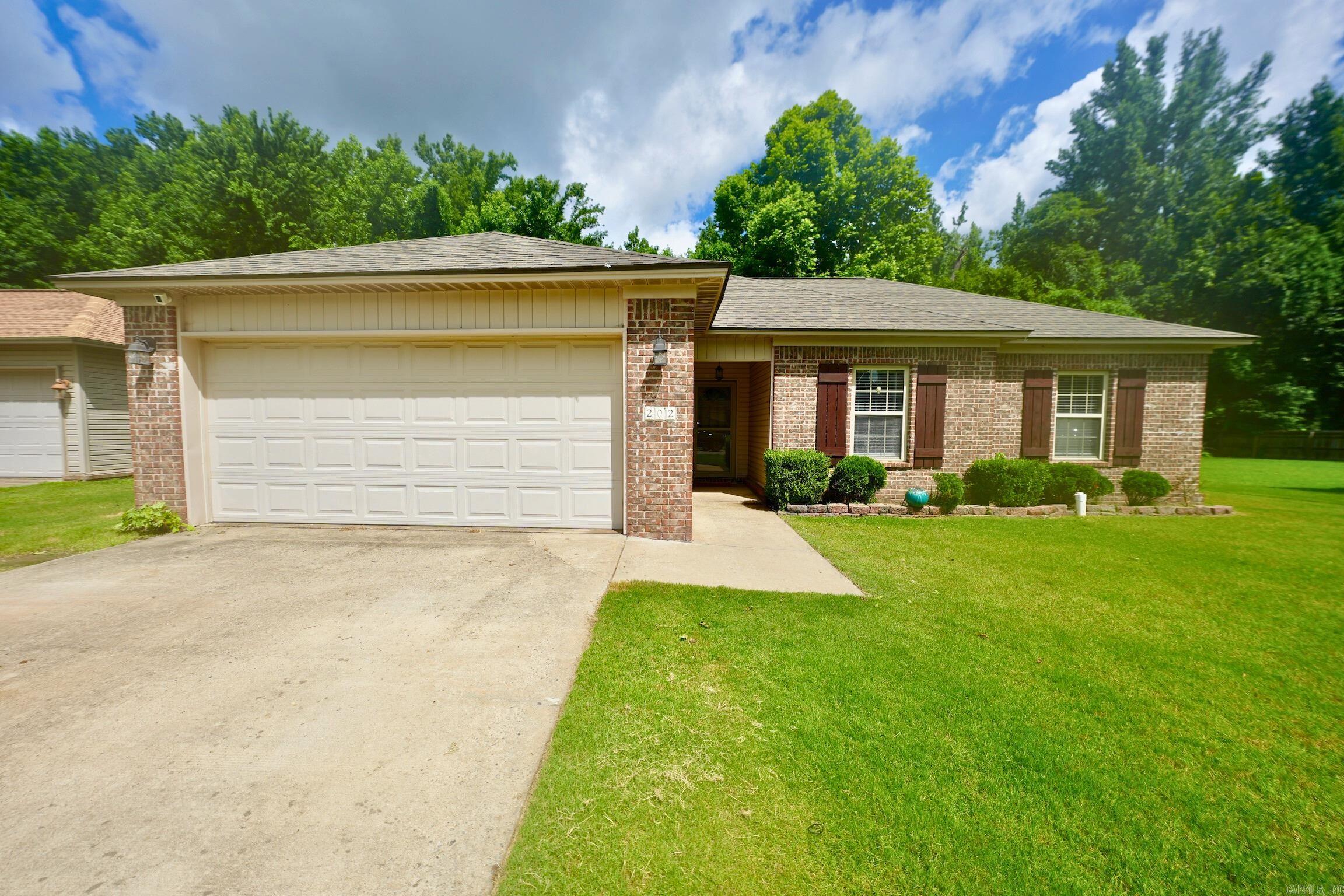 RD eligibleāqualified buyers could purchase this home with $0 down! Sellers are motivated, making this home a fantastic opportunity. Inside, youāll find 3 bedrooms, 2 bathrooms, and an open floor plan with no carpetājust hard surface flooring throughout, including tile in both baths. Fresh paint gives every room a clean, bright feel, and the kitchen features a brand-new stove, dishwasher, and water heater (2024), and a new roof in 2022. The spacious primary suite includes a massive walk-in closet and private bath. Located on a quiet, centrally positioned street just minutes from the interstate, this home offers quick access to Little Rock and is close to schools and shopping. The backyard backs to green space for extra privacy. This move-in ready gem has everything but youāschedule your tour with your favorite realtor today!