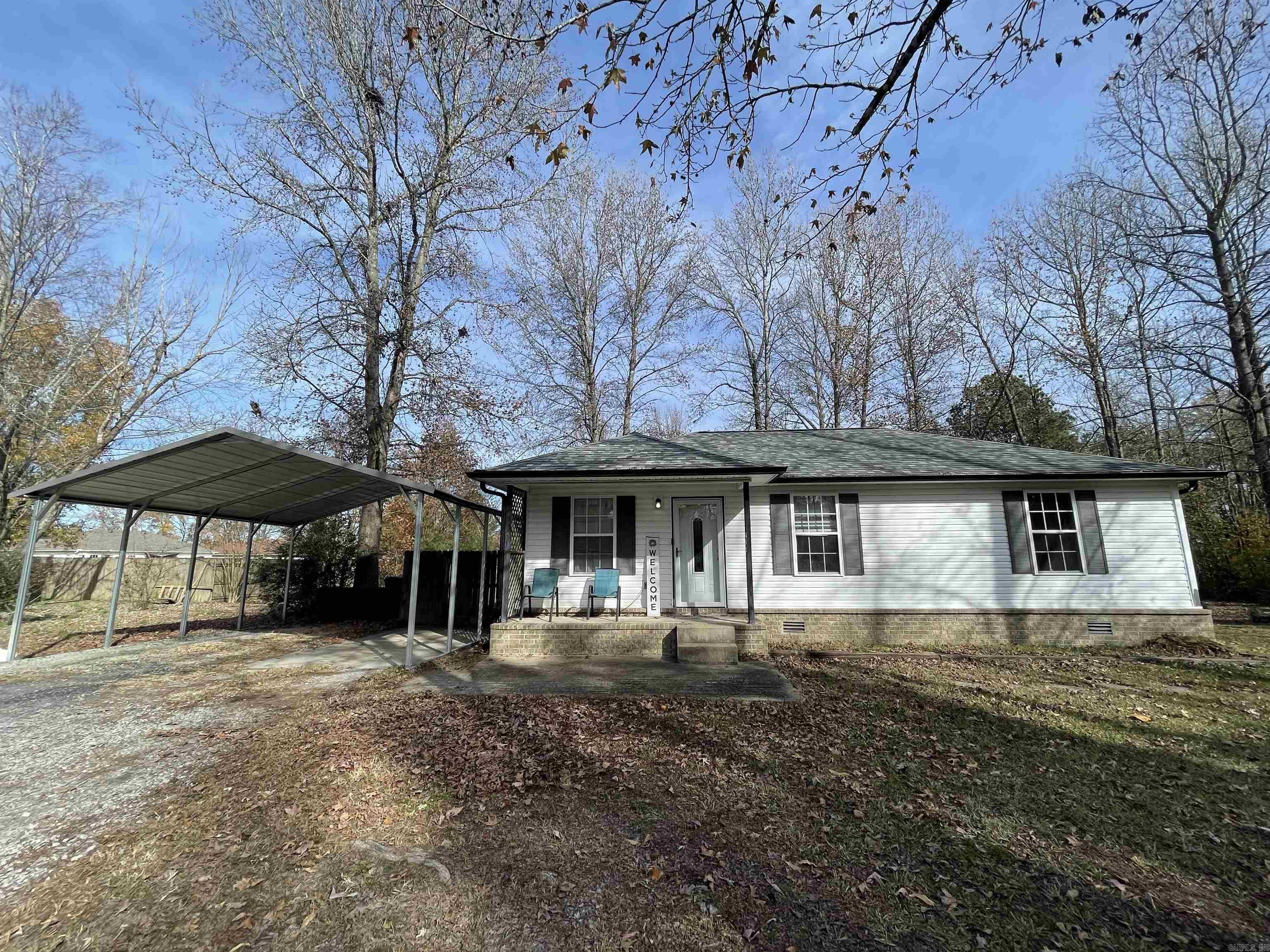 Do not pass this cute home up! Sits at the end of a short dead end road. Private road with only 5 houses including this one. The Ward pond is with in walking distance!! This home has a semi open floor plan. Livingroom, dining room separated by columns. Home has some fresh paint, flooring in the bedrooms and hall. Sellers have just added a new metal carport. There is a nice size shed/shop on the side of the property. Fully fenced in yard for kids or animals. New storm door, New roof and gutters Nov of 23, HVAC 24, New condenser & Coils 5/6 years old. Fridge, washer & Dryer will convey with an acceptable offer.