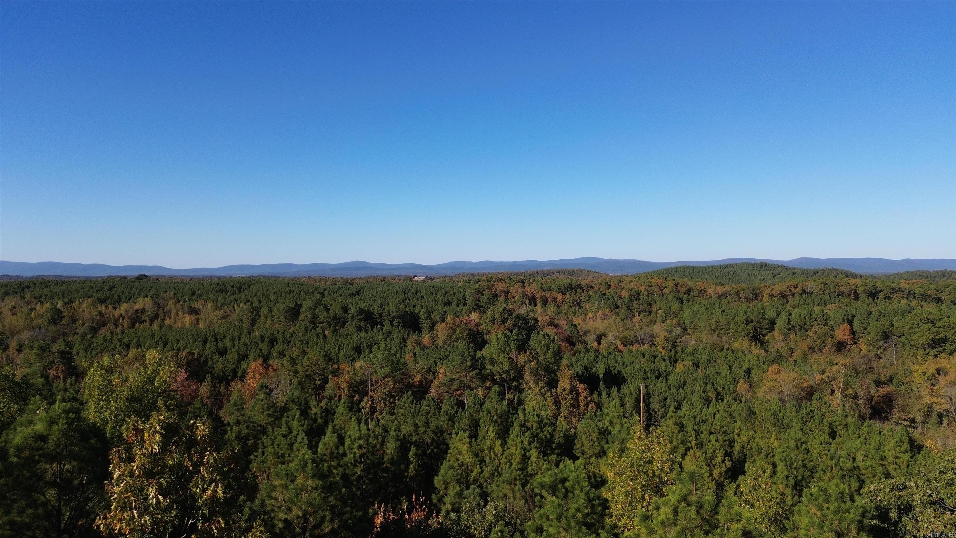 Looking for a getaway property primely located in the Board Camp Area? Take a look at this one! Breathtaking 360 views of the Ouachita Mountains with easy access to the Wolf Pen Gap Trail System. 17.53 wooded acres with multiple build sites. This property can be conveniently accessed by 3 road entry points. These sites are heavily sought after as investment properties, Don't miss your opportunity to own in this popular area!