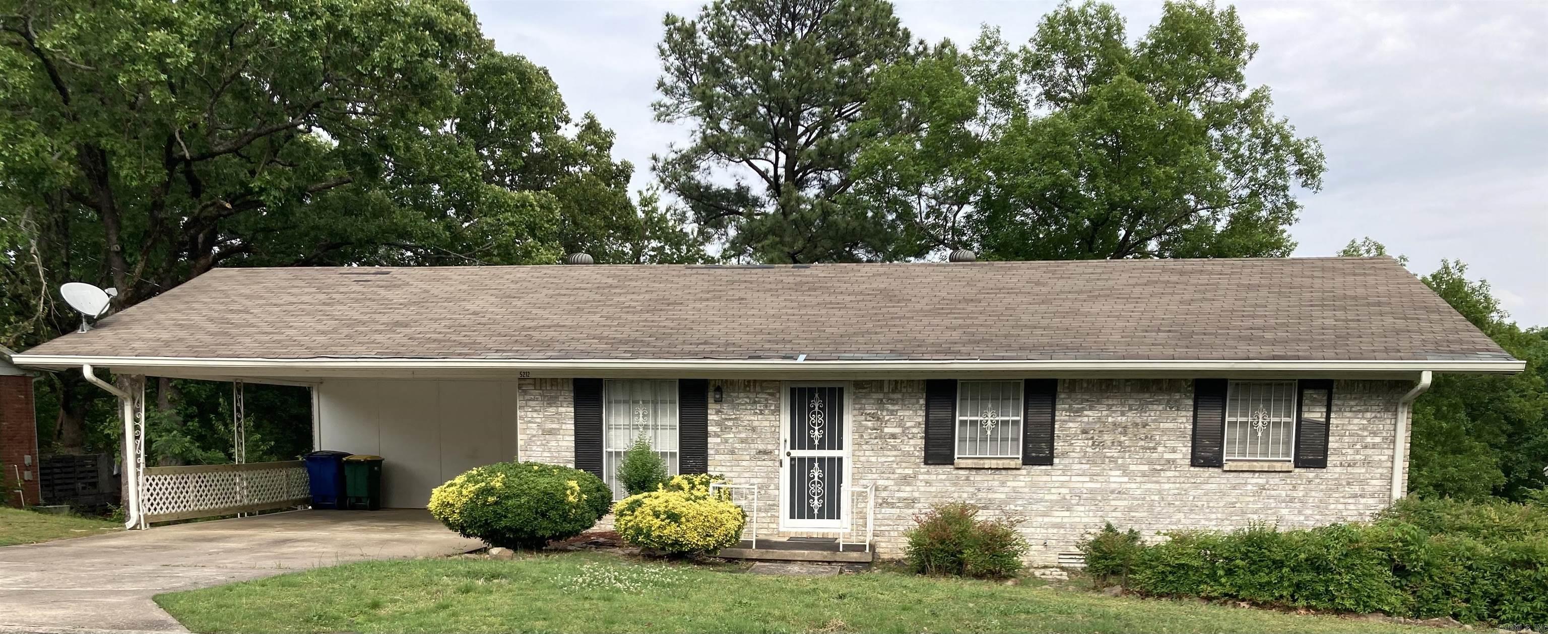 Convenient NLR Park Hill location w/ lots of updates. Wide open, tiled kitchen to dining to den area. Fully equipped kitchen w/ plenty of cabinetry and tiled counters/ backsplash. Big utility room off kitchen with extra cabinets/ storage. Hardwoods in second living area, hallway and bedrooms. Tiled bathrooms. Spacious master features full bath w/ large vanity and stall shower. Updated interior paint. Great under house storage. Double carport. Brand new deck to enjoy yard that backs to woods.