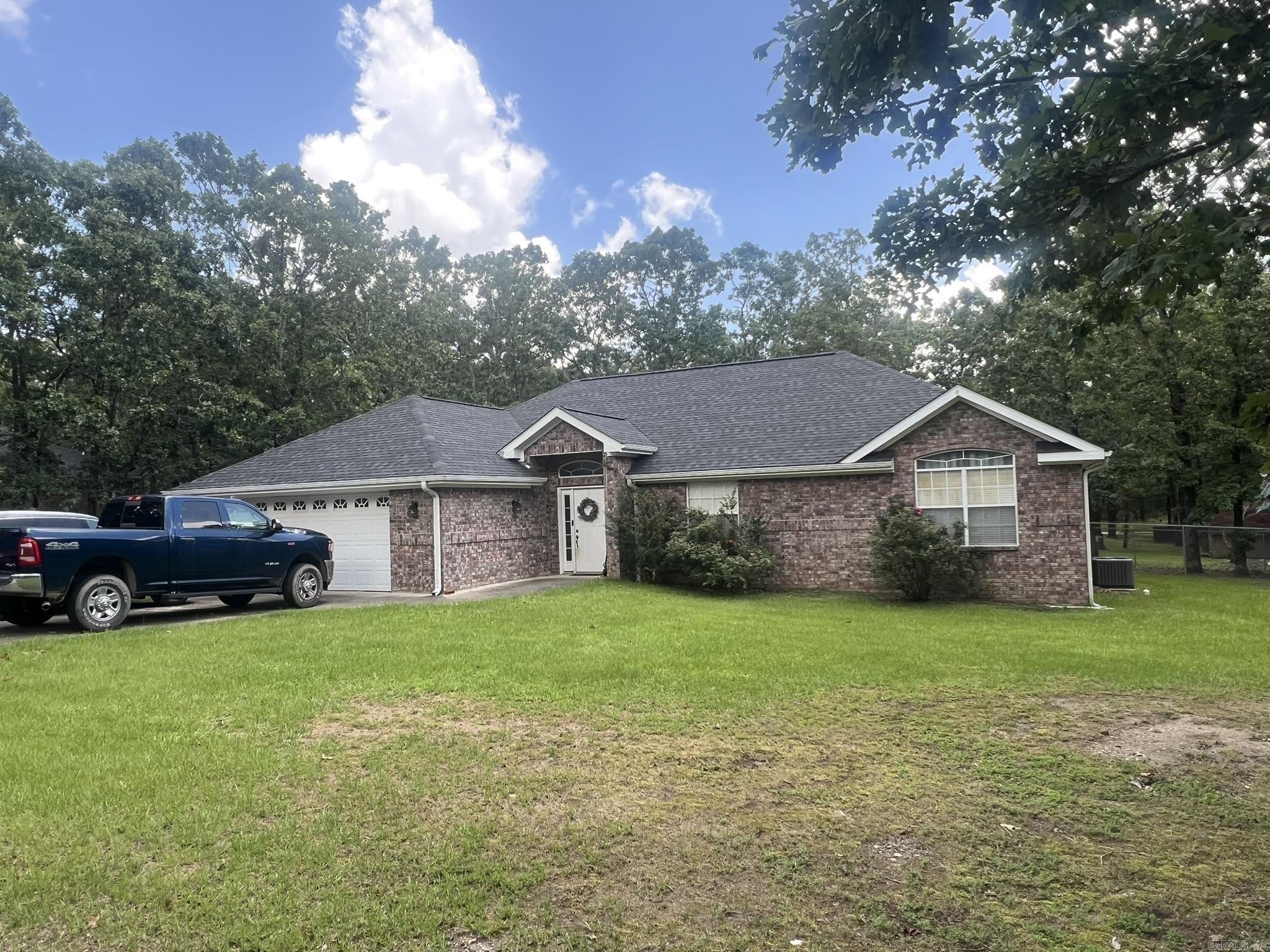 So many updates to this well-kept home in Timber Ridge Estates! Enjoy the open floor plan with the spacious foyer and tray ceiling in the living room. Large dining area that leads into a well-appointed kitchen with granite countertops, tile backsplash and stainless appliances, including a refrigerator that stays with the home. The laundry room is thoughtfully placed off the attached two-car garage. The bedrooms are located down a wide hallway, and there is an extra room that is the perfect office space. Two full bathrooms, and each have double sinks. Large walk in closet in the primary bathroom. The primary bedroom features a tray ceiling, and a secondary bedroom has a large window to bring in the light. All the flooring is new waterproof vinyl, and updates include a new HVAC, new water heater, and the house was painted in 2019. The home is also wired for a generator! The back patio is a great place to relax, the the back yard has a chain link fence. Also includes a storage building! Don't miss your opportunity to live in this wonderful subdivision!