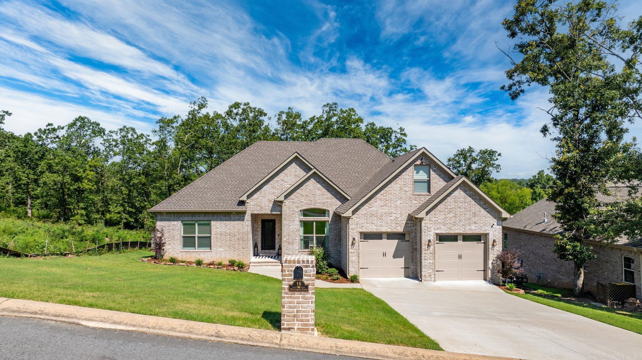 Youāve been searching for a home that feels like more than square footage ā a place thatās a reset, a deep breath. And then you find this: a 2023-built gem in Greystone, set on a half-acre with green space on two sides and the golf course just minutes away. Inside, an open-concept layout makes life flow effortlessly: a living room anchored by a gas fireplace and built-ins, a wall of windows framing wooded views, and a chefās kitchen with quartz countertops, gas range, and abundant cabinetry, all connecting easily to the dining area and back deck. The split floor plan offers two guest rooms with a stylish double-vanity bath on one side and a private primary suite on the other, featuring a spa-like bath, soaking tub, oversized shower, and direct patio access. Upstairs, a fourth bedroom with full bath creates the perfect guest retreat or home office. Outside, a golf cart garage on the side of the home adds convenience, while the oversized deck overlooks a fully fenced, large backyard built for gatherings, kids, or simply quiet mornings. Welcome home to Wellington Place ā a fresh start, built for connection and ready for your next chapter.