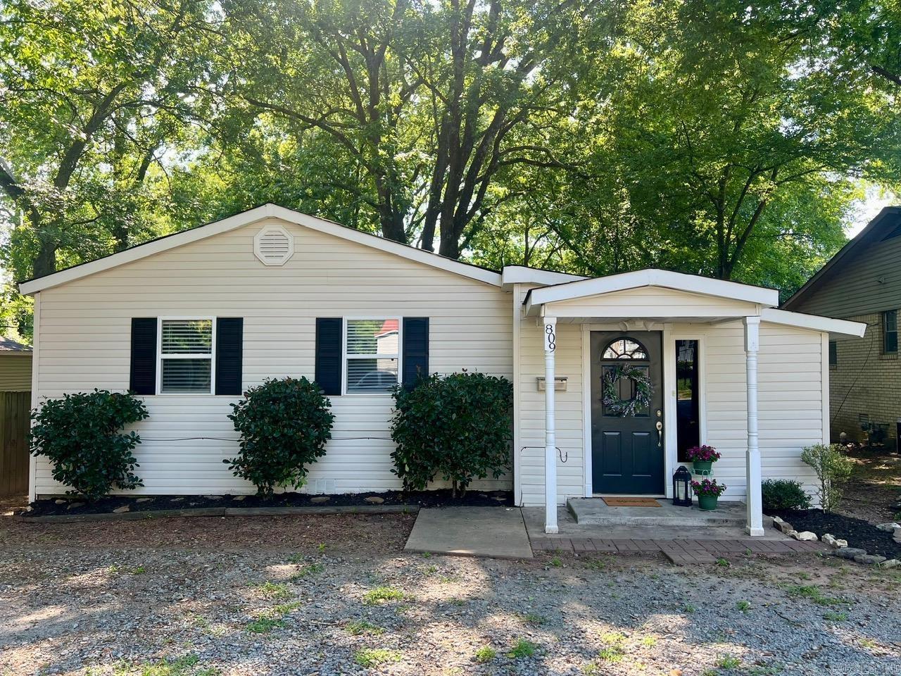 Charming bungalow in downtown Benton offering 3 bedrooms and 1.5 baths. Recently updated with fresh paint throughout. There are laminate floors, and tile in wet areas. Enjoy modern touches like granite countertops, new recessed lighting, fans, and light fixtures. Outside, a large deck and storage building add convenience and space. Ideal for homeowners or investors seeking a turnkey property.
