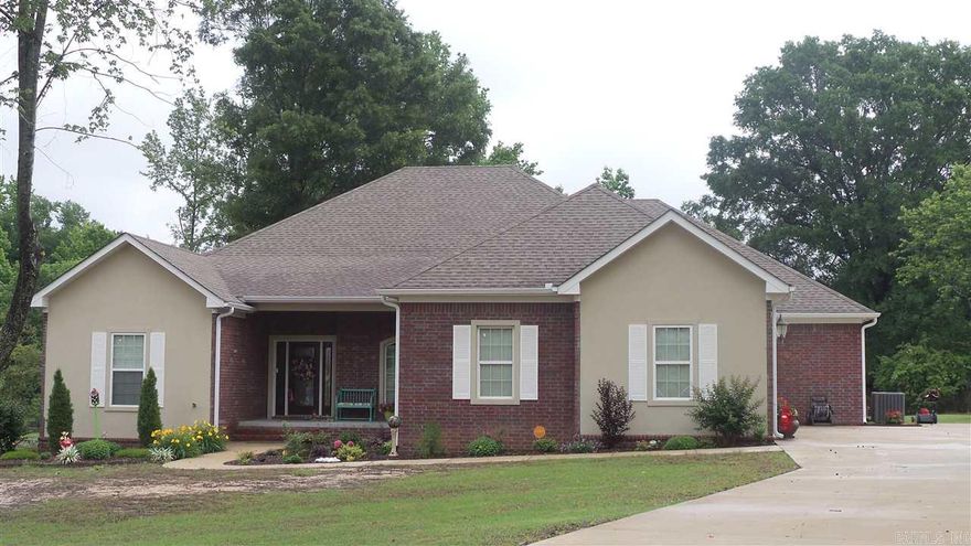 Beautiful country living just minutes from town. Gorgeous 4 bed, 3 bath, with open floor plan, office, and custom design. The kitchen is beautiful with custom cabinets, granite, open to the living area, and all the extras. Gas FP in the living room, surround sound, big laundry, tons of storage space, and three car garage. Also has security system with 4 active cameras.  Home is open and bright and sits on 1.99 acres with a pond. Lots to offer! Sq. Ft. approx. measuring encouraged. See Agent Remarks!