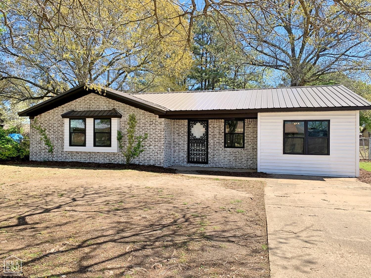 This newly remodeled home features new stainless steel appliances, new windows, new roof, fresh paint, and new floors!