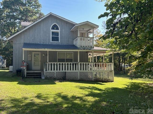 No. 02409 Charming 2-story, 3-bedroom, 2-bath home with 1,594 sq ft of living space, nestled on a large 0.84-acre lot with dual street frontage. Located on a peaceful, tree-lined street in town, this home offers modern comfort with central HVAC, a Generac generator, and a new roof. Features include a detached single carport, a double carport with storage, and inviting wrap-around porches on three sides. Inside, you'll find beautiful pine plank flooring, a spacious loft with a sitting area, and balcony access. Kitchen appliances are included. Enjoy quiet living with in-town convenience. Priced at $210,000.