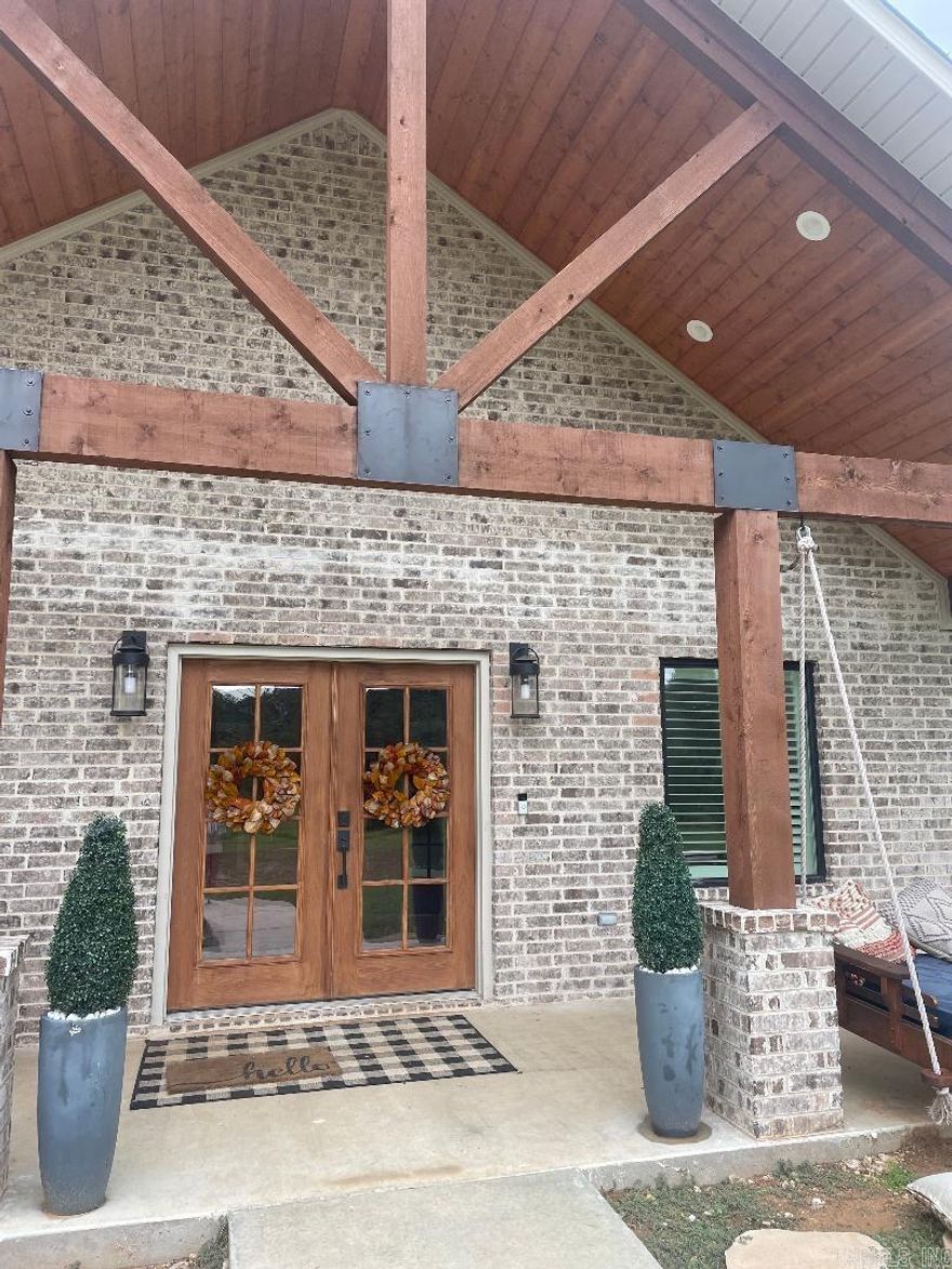 Stunning, spacious, newly built home on private setting on just  over 2 acres! This home owner thought of everything when building this amazing home. Lots of extras, including walk in pantry, granite counters in kitchen and all baths. Fireplace, valuted ceilings in large open living room.  Bonus room upstairs for entertaining or possible 4th bedroom. Great office space.  The master bedroom has a closet to die for! Lots of custom built-ins including an island dresser. Huge master bath with walk in shower and separate free standing tub.   Back porch runs along nearly the entire back of the house with entrance into the bedroom or kitchen area. 24x34 shop!