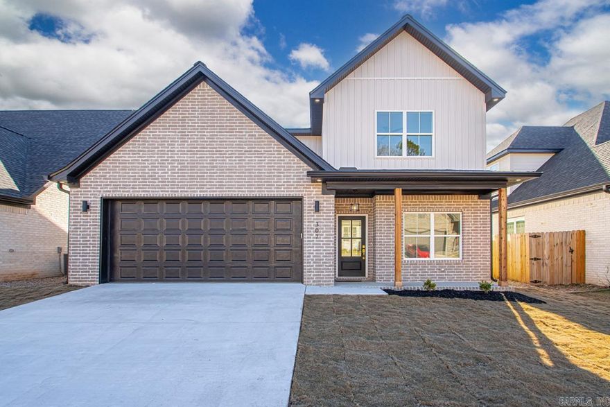 Modern Luxury Meets Ultimate Convenience in Kanis Ridge. Discover finished new construction in one of West Little Rock’s most sought-after boutique subdivisions. This 4-bedroom, 2.5-bath home blends elevated design with everyday livability. Just down the street from highly rated Baker Elementary, the location is ideal for anyone who wants top-tier education and a quiet, well-maintained community. The heart of the home is a chef-inspired kitchen with natural quartzite countertops, an expansive eat-at island, and a large dedicated butler’s pantry that keeps prep space organized and counters clutter-free. Retreat to the main-level primary suite featuring a spa-like bath with dual vanities, a deep soaking tub, and an oversized walk-in shower with rain head. The massive walk-in closet connects directly to the laundry room for everyday ease. Work from home in your luxurious modern office with french doors! Upstairs, you will find three generous bedrooms, a full bath, and impressive walk-in attic storage with floored space. Every detail is complete, move-in ready, and ready to enjoy. Enjoy a quiet, tucked-away setting with easy access to West Little Rock favorites. See it today!!