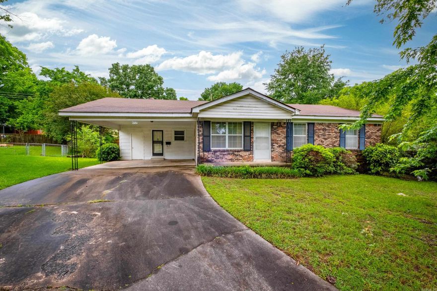 One story home on cul de sac lot.  Covered carport, back porch and front porch.  Living room, Eat in kitchen and laundry room.  Breakfast bar, refrigerator, coat closet and linen closet.  Sliding glass doors to backyard, pantry and floored attic.  This would be a great first time home or investment property.  Home to be sold as-is.