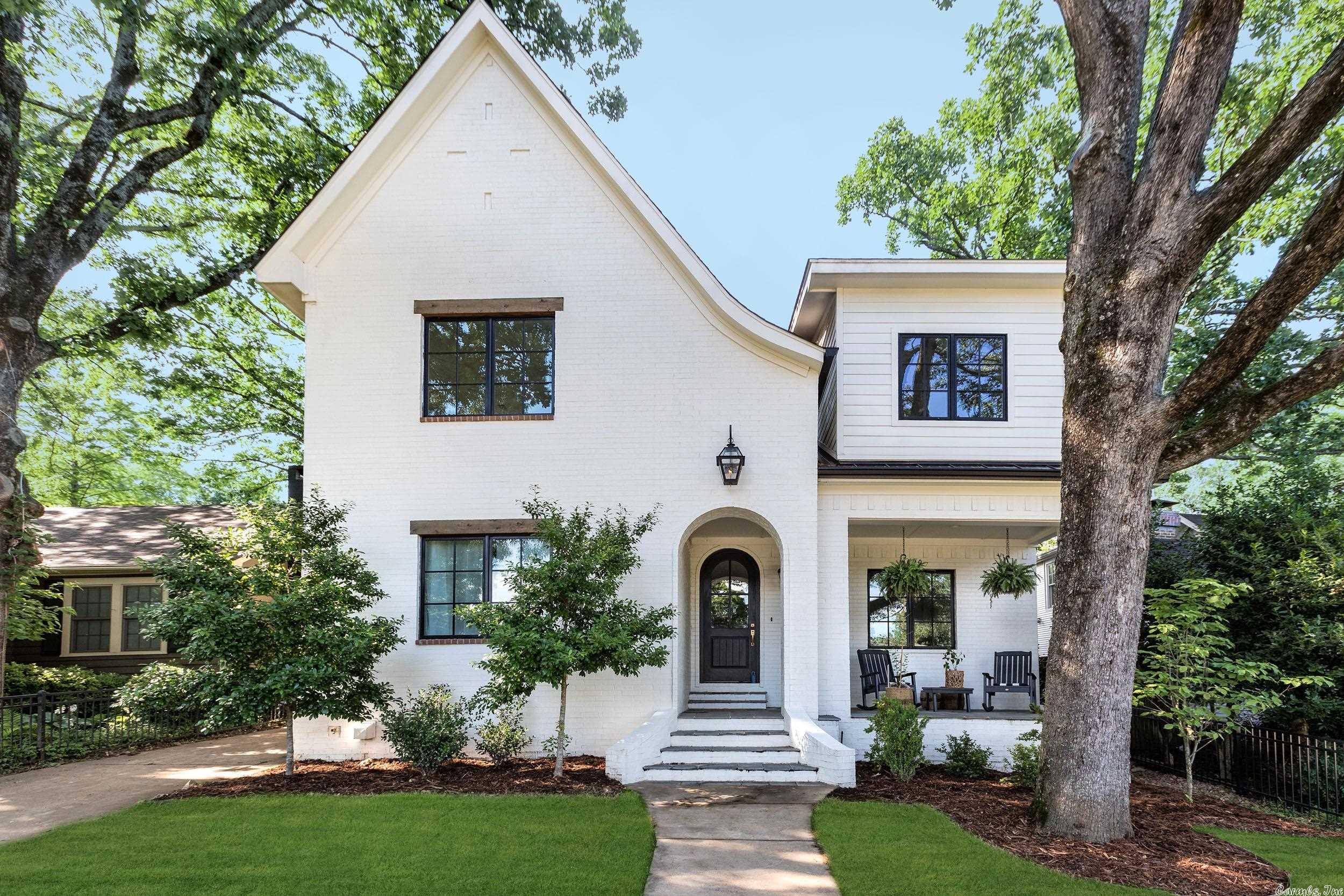 Stunning Custom built home in 2019 in a highly sought after area of the heights,  one block from from Kavanaugh, walking distance to all the Heights shops and restaurants. 4 Bedrooms 3.5 baths plus a bonus room and office.  Open concept with a chef's kitchen with 6 burner cooktop, double ovens and oversize island. Primary bedroom on the main level with stunning bath and large walk in closet. Newly added screened in porch and new sod.