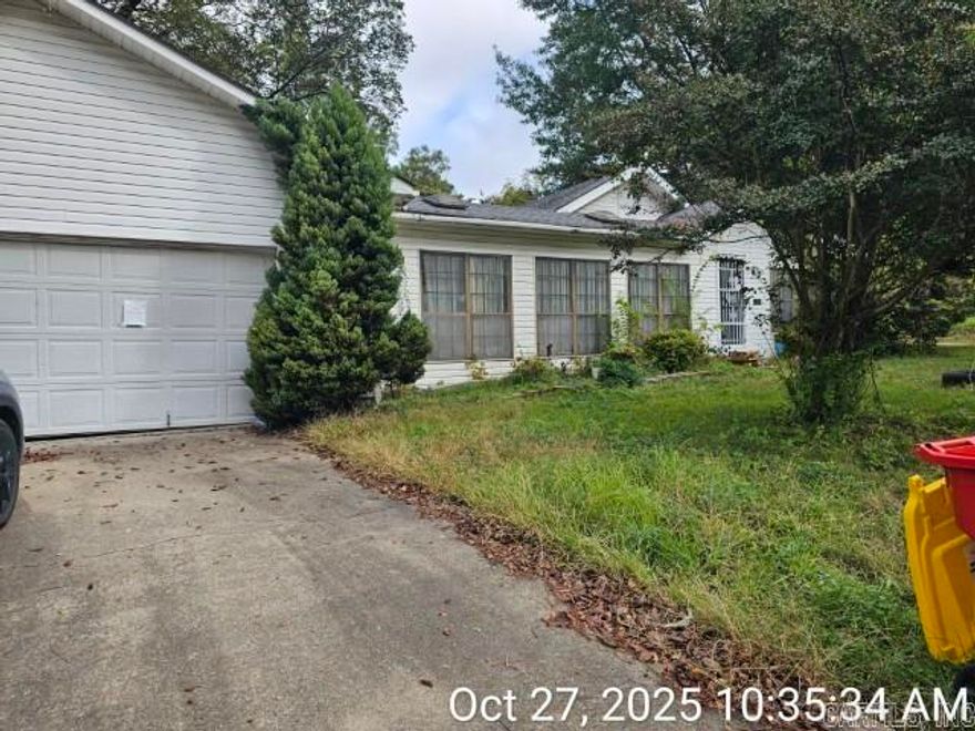 Take a look at this large home situated on a large corner lot and in the heart of Morrilton! Close to schools, this home has a lot of potential with the open floor plan and large entertaining area on the back deck. This would be a great investment opportunity! Agents read confidential remarks.