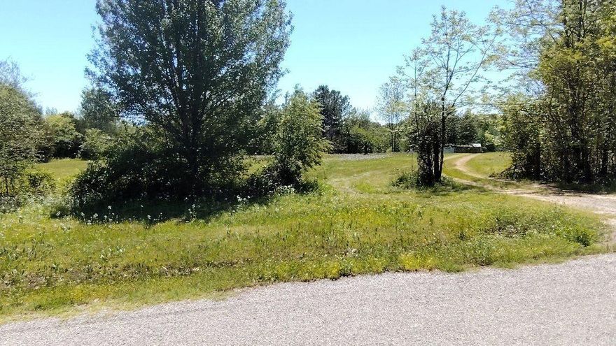 Great lot to build a home or put in a mobile.  About 4 acres is cleared about 1 has trees.  There is a mobile on this property that we have given no value.  Water, Septic and electric on property.   Bring your kids and animals and move to the country.