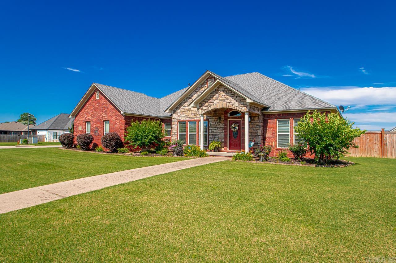 Welcome to this beautiful well-maintained home in a wonderful subdivision. The wide-open spacious floor plan is perfect for entertaining. There are 3 bedrooms, 2 baths plus powder room, bonus/office/tv room. Jack and Jill bath between guest bedrooms. The rear covered porch was recently glassed in to create an inviting sun room that is heated and cooled. From the concrete pad with pergola, to the newly planted trees and lovely perennial bedding plants, you will love the landscaping the owner installed. The addition of a 16 X 10 metal storage/shop building is handy for the hobbyist or for storing landscape equipment. The garage features ample storage and an in-floor storm shelter with sliding door. Newly installed LVT flooring in main areas and primary. Carpet in guest rooms is newer and in great condition. The range in the kitchen was replaced in 2023. Agents please read remarks regarding closing/occupancy.