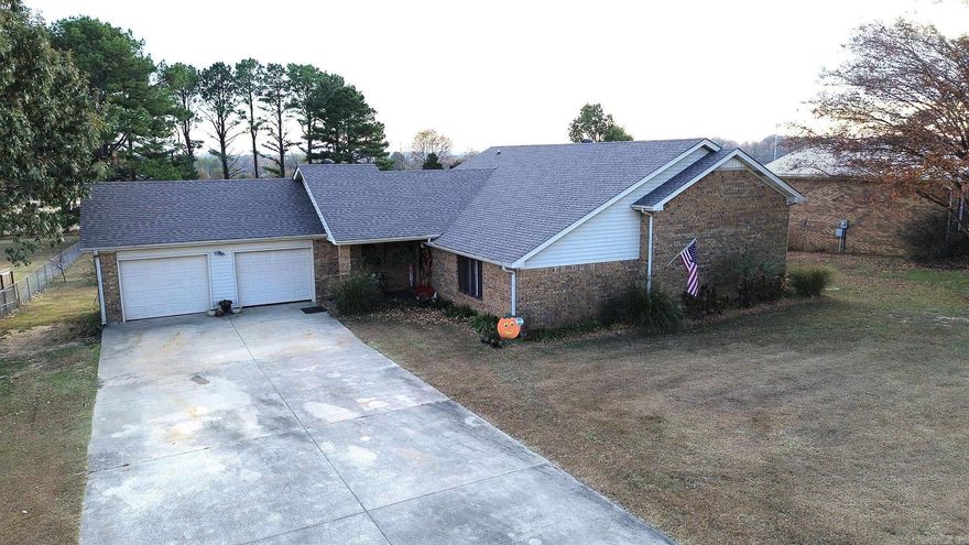 This cozy home sets on one of Paragould's best kept secrets. Hillview St. which is just right outside of the North of Paragould. Located on a closed/dead end street this 2626 sq.ft. home will provide all the privacy AND space a family may need. This all electric spacious home sets on a 0.76 lot enclosed at the back; and sides, with a chain link fence. The 3 bedroom, 2.5 bath Tri-Level home is very welcoming as you walk in to the entrance. Just at the right of the entrance is a wonderful living room with a vaulted ceiling and HUGE "entertainment" center that goes with the home.  Carpet, luxury vinyl & tile make up the flooring for this home while having huge walk-in closet in several rooms and more storage throughout the home. A cute little deck is just located off the upper bedroom leading down to a covered patio where you can have your coffee and look at the sprawling back yard.   In addition a huge storage area with shelving is located on the lower level of the home; as well as an outdoor storage building that goes with the property. You should call your REALTOR and make an appointment to see this home. New ROOF done in 2023.