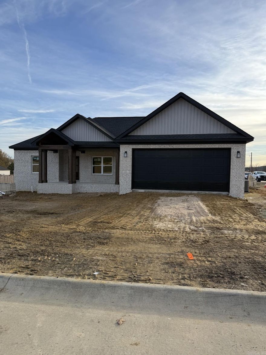 Welcome to this stunning new construction home that blends modern design with thoughtful craftsmanship. This custom built, one of a kind residence offers 4 spacious bedrooms, 2 full bathrooms, and 1,850 square feet of beautifully designed living space. From the moment you step inside, you’ll appreciate the open layout, abundant natural light, and quality finishes throughout. The living area features a sleek electric fireplace, creating a warm and inviting atmosphere perfect for everyday living or entertaining. The thoughtfully designed floor plan provides plenty of space for relaxation, work, and gathering. Step outside to enjoy the covered back porch, ideal for morning coffee, evening unwinding, or hosting guests year-round. With generous room sizes, modern comfort, and a unique custom touch you won’t find in typical new builds, this home truly stands out. Don’t miss the opportunity to own a beautifully crafted new construction with space, style, and functionality all in one.