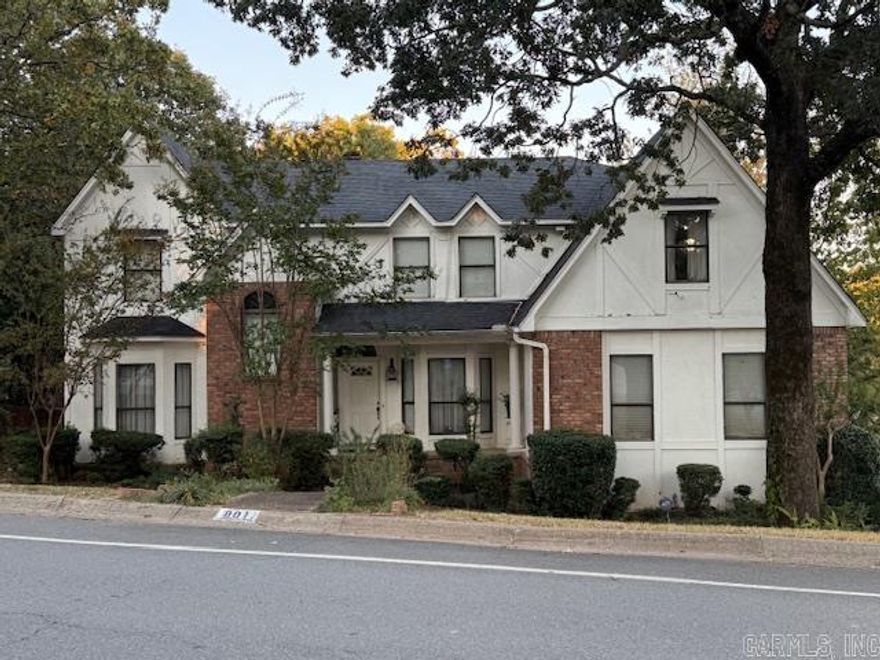 This is a unique opportunity for investors or families seeking a spacious two-story home in the coveted St. Charles Subdivision. This 5,003 sq. ft. property offers immense potential, featuring five bedrooms and three and a half bathrooms, making it perfect for accommodating your needs. The home’s roof was replaced in 2018, and two out of three HVAC units were replaced in 2024.  Inside, you'll find formal dining and living rooms, along with an oversized great room featuring a double fireplace that adjoins the kitchen. The roomy eat-in kitchen offers ample space for a dining table and features two bar areas, ideal for casual dining. The master suite is conveniently located downstairs, complete with an en-suite bath. Four additional bedrooms and two bathrooms are situated upstairs. A double-car garage and numerous closets provide storage options. The property is located on a large corner lot with mature shade trees, offering natural beauty and privacy. This home is ready for your updates and personal touches.  Please note that portions of the back deck require board replacements, and it is currently inaccessible. The house is being sold "As Is."  See Agent Remarks