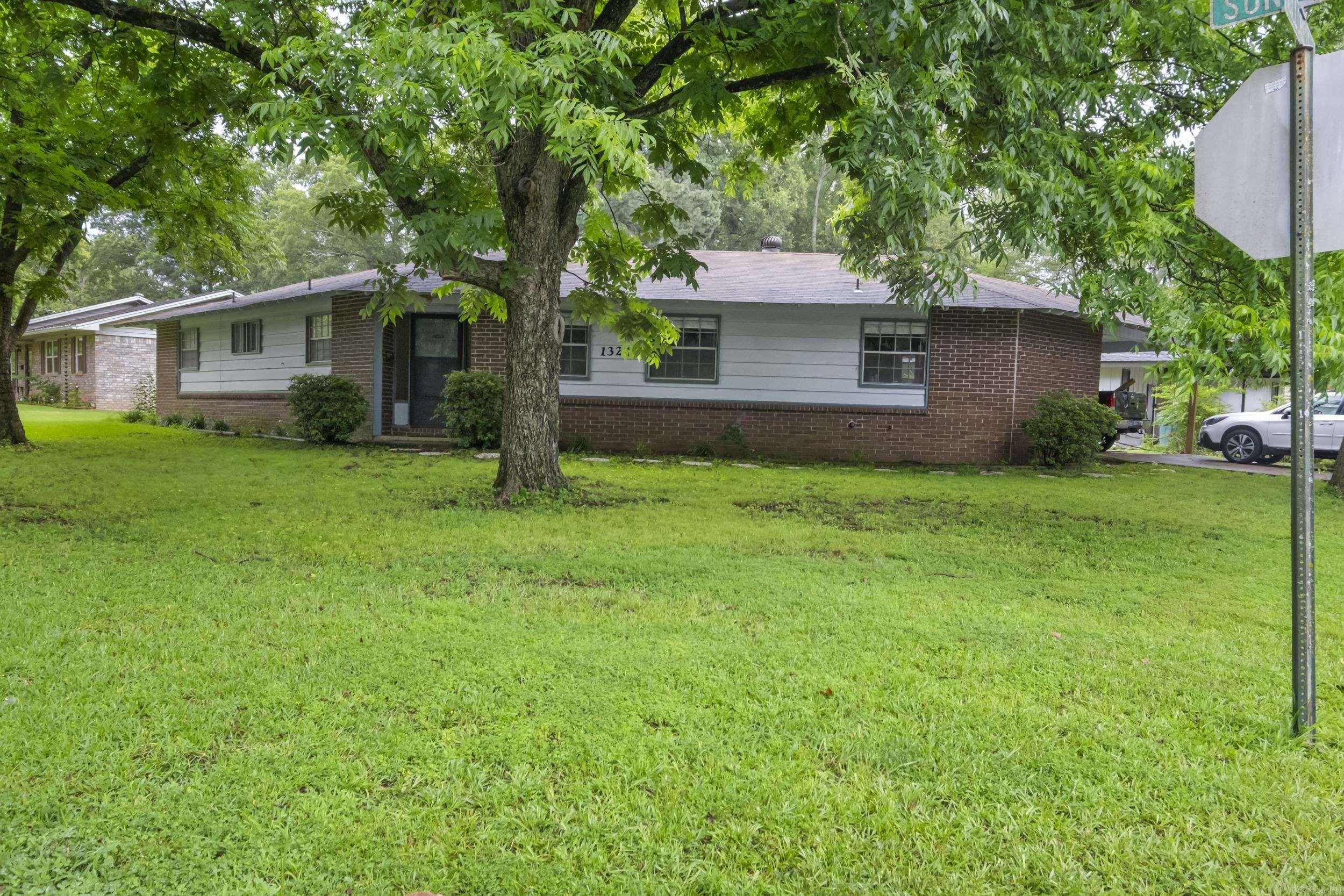 Take a look at this beautiful, well located home! This home is within walking distance to the high school and an easy commute to downtown, the interstate and colleges. Also within walking distance is Conway's beautiful Tucker Creek trail and park. Enjoy the evenings on the screened in porch in the fully fenced backyard. It boasts a spacious open floor plan and a new HVAC (2023). Come check out this recently remodeled home in the heart of Conway.
