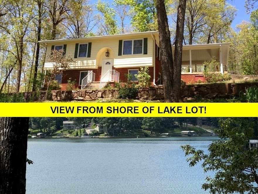 LAKE THUNDERBIRD LOT plus 2016 sq. ft. m/l home-with great LAKE VIEWS! Replacement windows, newer roof, 2010 1000-gal concrete septic tank.  Wood flooring through-out, super updated kitchen with white bead board cabinets, stainless steel appliances, built-in microwave, solid granite counters, big drawers, big pantry, and extra-large storage closet!  Kitchen spills into extra-large dining room with great lake views (seasonal)... And both kitchen and dining room share view of native stone fireplace... Living room enjoys more lake views, full bath upstairs as well as nice bedroom with extra-large closet.  Downstairs is another full bath, 3 bedrooms, one bedroom could be  bonus room (currently being used as a bedroom-no closet).  2024 central gas heat and central air.  Gas back-up heater, security system, big 2-car carport.  Walk across the street & down your own path to THUNDERBIRD LAKE!  Just a block away is the North Rec Center (open seasonally)-with pool, putt-putt golf, fishing pier, and great walking trail.  Great price - $274,900.  Requires notice to show... #2412 SqFt, measurements,  taxes are per ARCoData