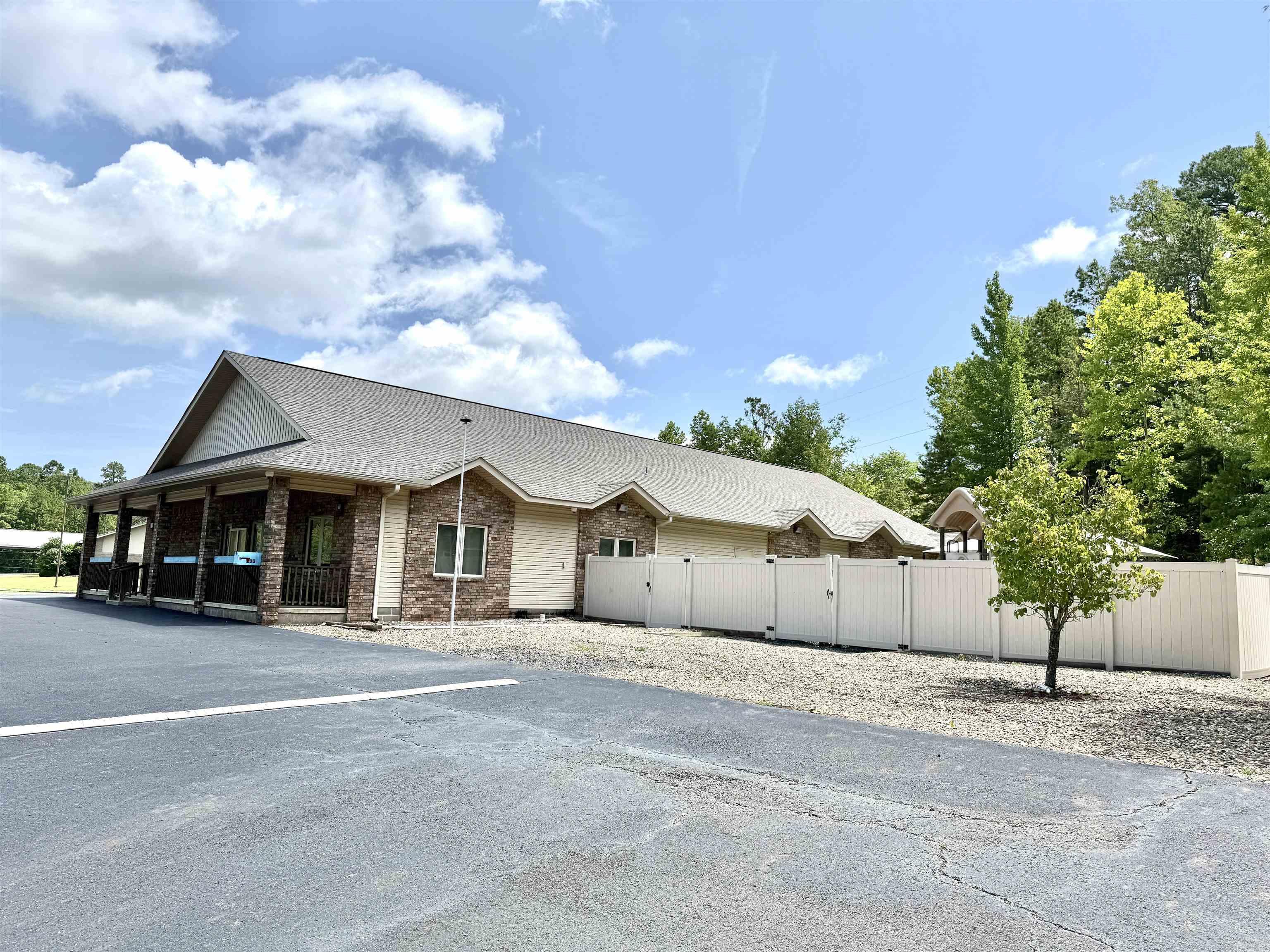 Located in Hot Springs Village a gated community you will find the former day care facility that is all set ready for a new owner. This 5000 sq ft building can be converted to offices should you desire. There is a separate out building great for additional storage. Please see Documents for deed restrictions.