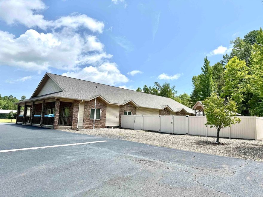 Located in Hot Springs Village a gated community you will find the former day care facility that is all set ready for a new owner.  This 5000 sq ft building can be converted to offices should you desire.  There is a separate out building great for additional storage. Please see Documents for deed restrictions.