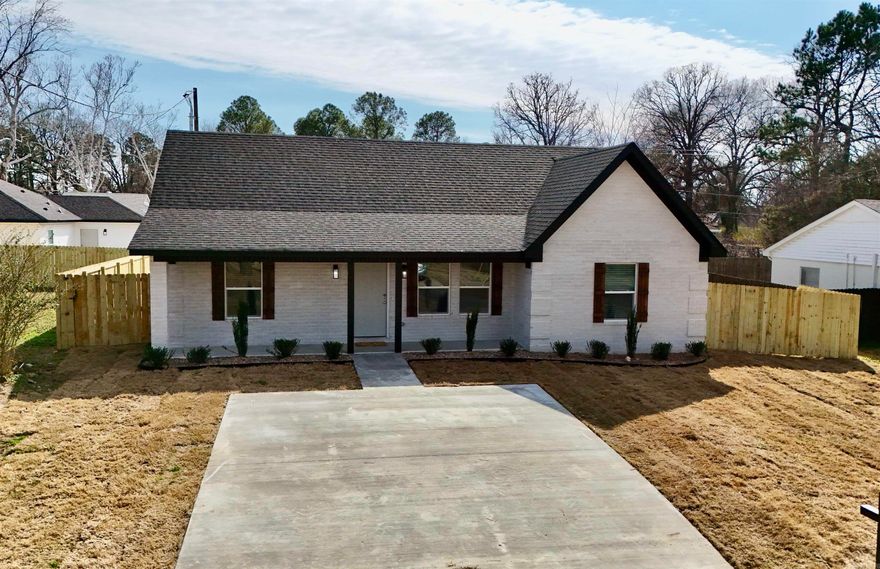 Be the first to own this beautifully built new construction home in the heart of Cabot! Featuring 3 bedrooms, 2 full bathrooms, and 1,322 square feet of thoughtfully designed living space and timeless curb appeal with today’s most desirable finishes.  The crisp white brick exterior, bold black trim, warm wood shutters, and inviting covered front porch create a striking first impression. Inside, you’ll find a bright, open layout with recessed lighting, durable luxury flooring, and a fresh neutral paint throughout. The kitchen offers white shaker cabinetry, sleek black countertops, stainless steel appliances, and modern fixtures, perfect for everyday living and entertaining. The private primary suite provides a relaxing retreat, while the spa-inspired bathroom features a freestanding soaking tub, frameless glass walk-in shower with designer tile, matte black hardware, and elegant marble-look flooring. Enjoy peace of mind with all-new construction including roof, HVAC, plumbing, electrical, and appliances, providing low-maintenance living for years to come. Conveniently located in Cabot with easy access to schools, shopping, and dining, this move in ready home is a must-see!