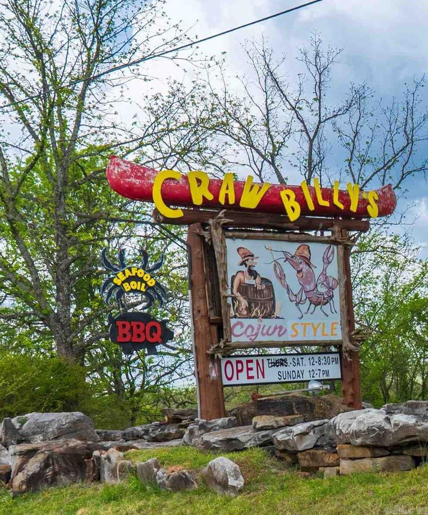 Turn-key investment opportunity near the heart of St. Joe! This unique property includes Craw Billy’s Seafood Boil & Bar-B-Que, an established restaurant and antique/oddities store, along with 4 Airbnb cabins and a main residence.  Situated on Hwy 65 at the Hwy 333 turn, this high-visibility location offers excellent exposure for both restaurant and short-term rental income. The cabins provide immediate or future income potential, while the on-site home offers convenience for an owner/operator or long-term rental.  Note: Main house photos coming soon. Cabin 3 is currently under construction. All buildings, businesses, and land convey with the sale.  Whether you’re looking to expand your investment portfolio or step into a live/work opportunity, this property offers multiple income streams in a prime tourist corridor near the Buffalo National River.