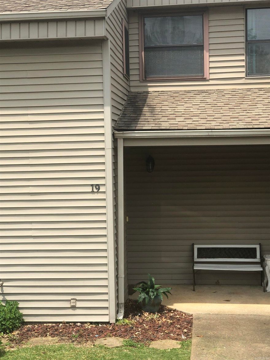 GORGEOUS & Updated 3 yrs. ago and ready for a new owner. This Condo comes fully furnished all you need is to bring your clothes.  This 2 bedroom, 1.5 bath on 2 levels is near the private association pool.  Open floorplan in living/dining/kitchen.  The kitchen has been completely remodeled with new counter tops, oak cabinets, wainscot, & great appliances. Both baths are also updated, and the full bath has a walk-in shower.  One BR has an office/TV nook with built-in desk and cabinets.  Master BR has built-in drawers to allow for more floor space, plus a built-in ironing board.    New flooring is vinyl plank & carpet.  New doors, windows and light fixtures.  This beauty has a patio that overlooks a wooded area.  Come look at this one. Everything is Super nice!!  Centrally located for enjoying amenities, shopping, restaurants, banks, etc.